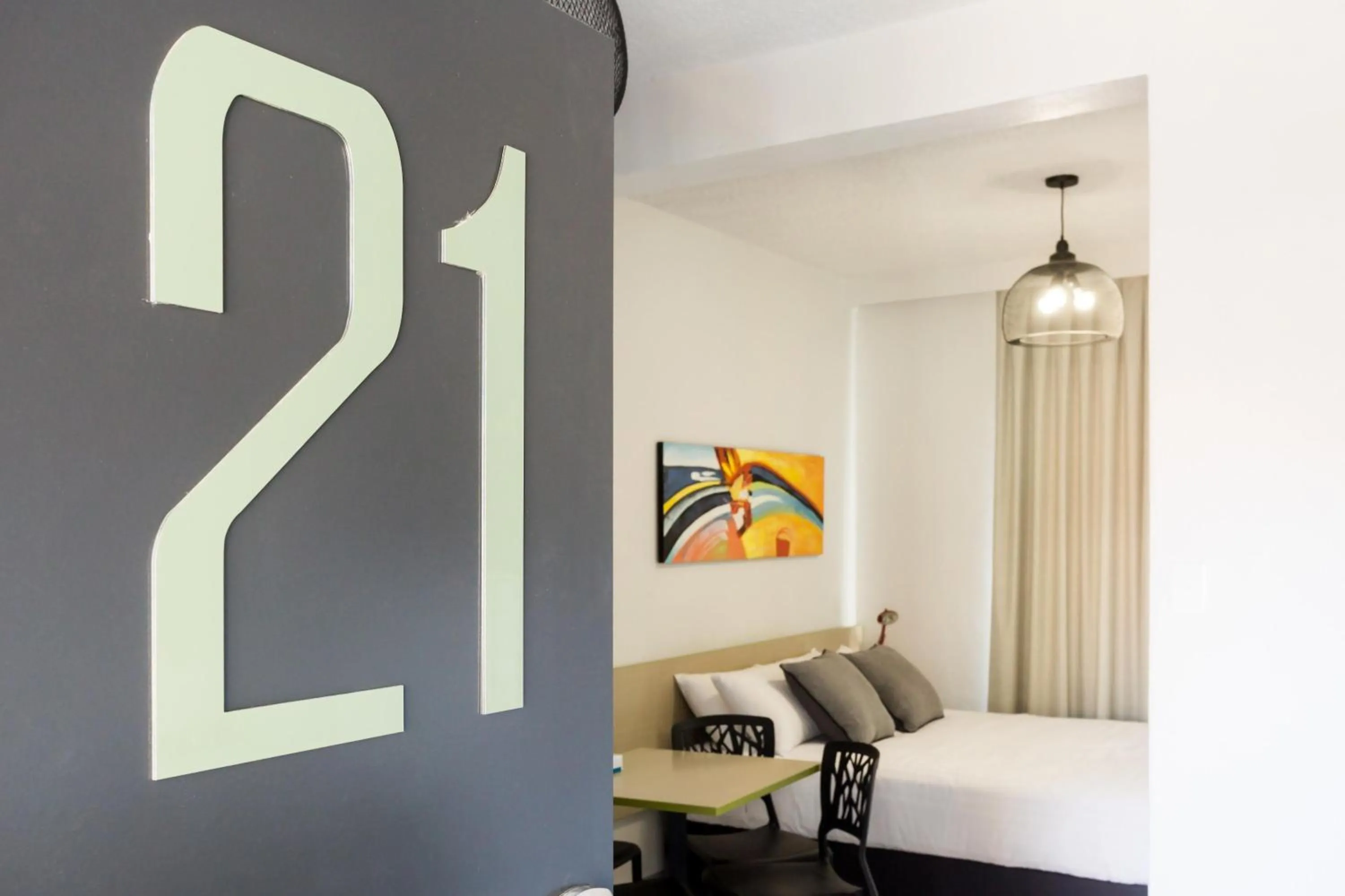 Bedroom, Bed in Nightcap at Emerald Star Hotel