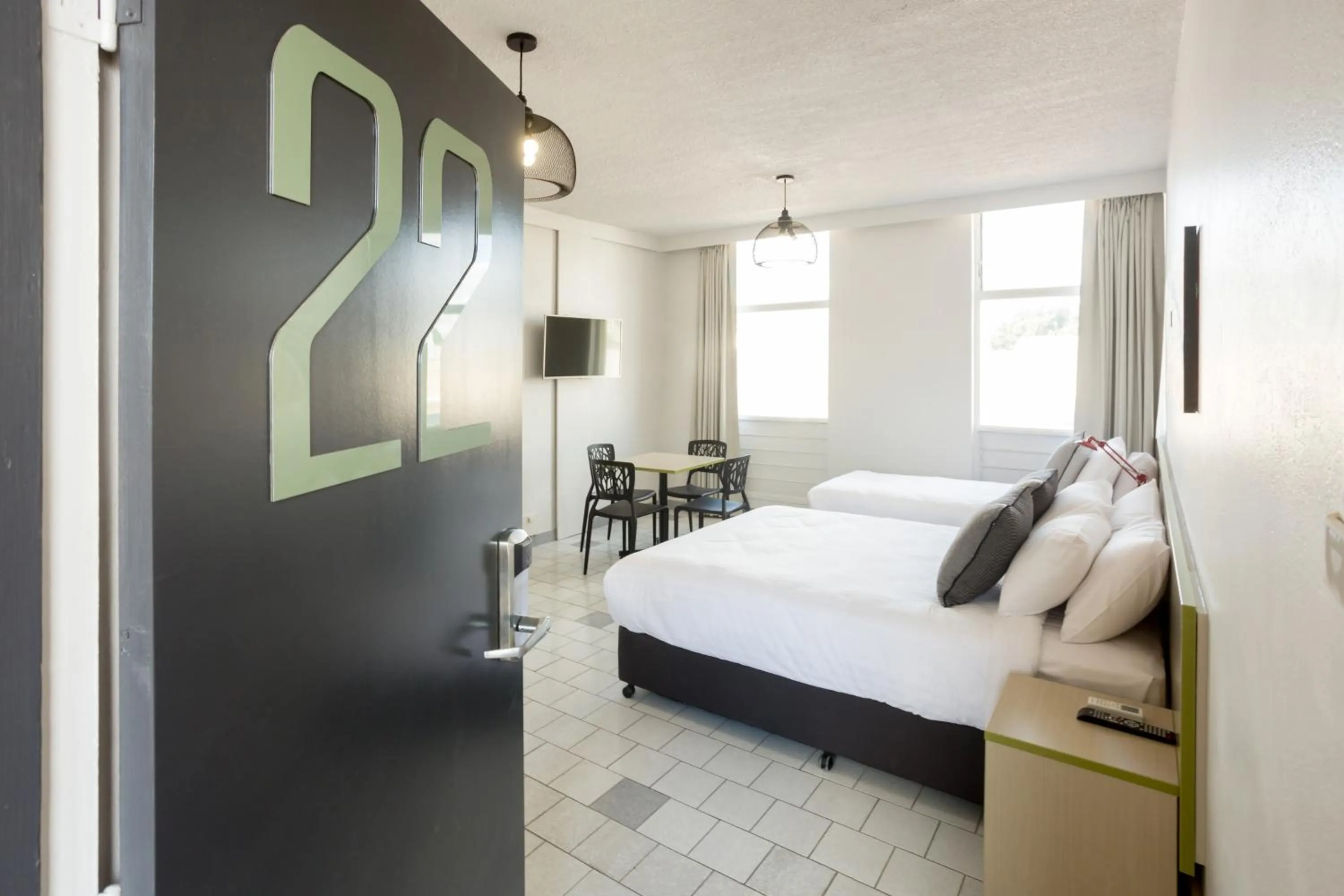 Photo of the whole room, Bed in Nightcap at Emerald Star Hotel