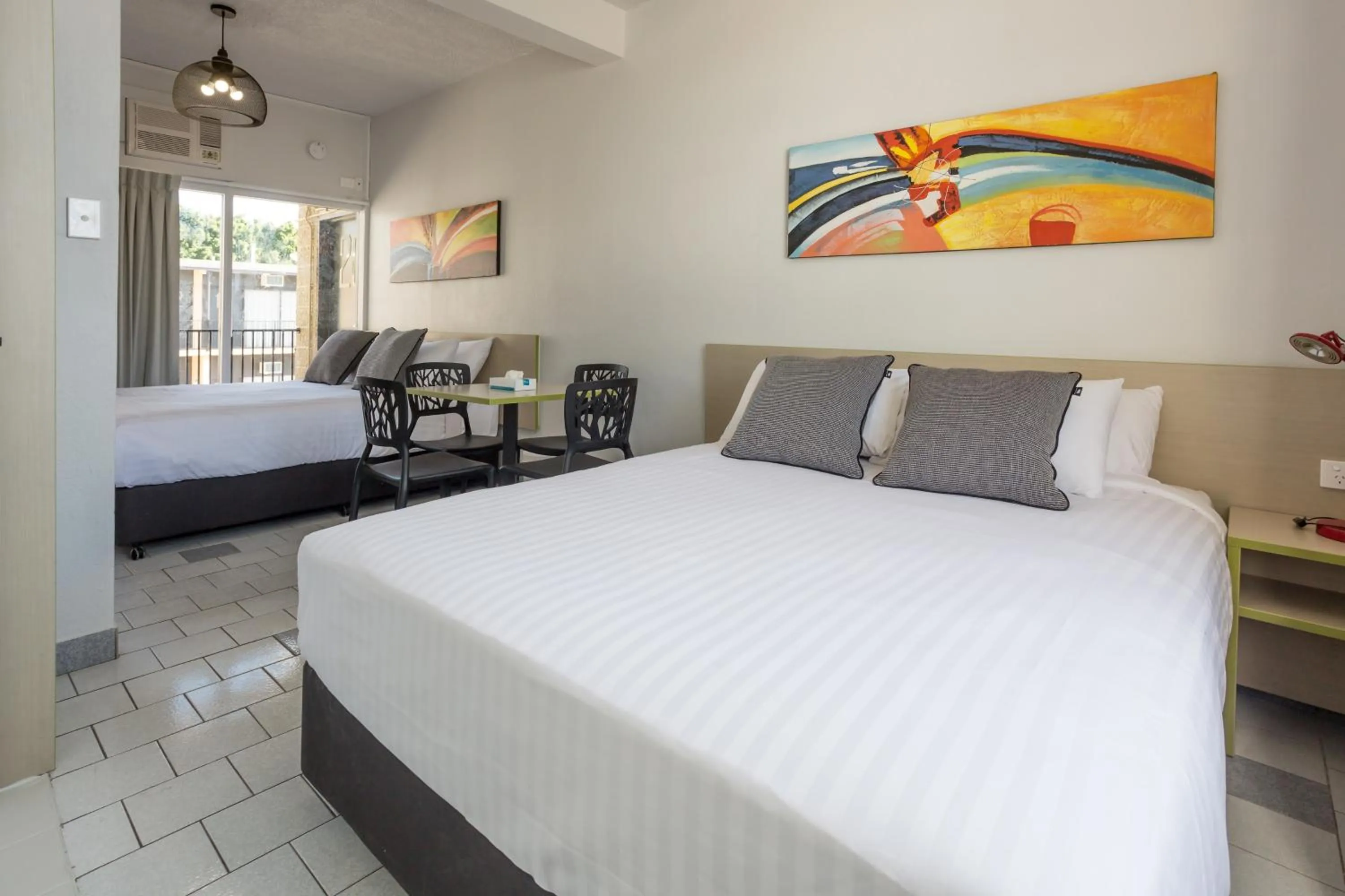 Photo of the whole room, Bed in Nightcap at Emerald Star Hotel