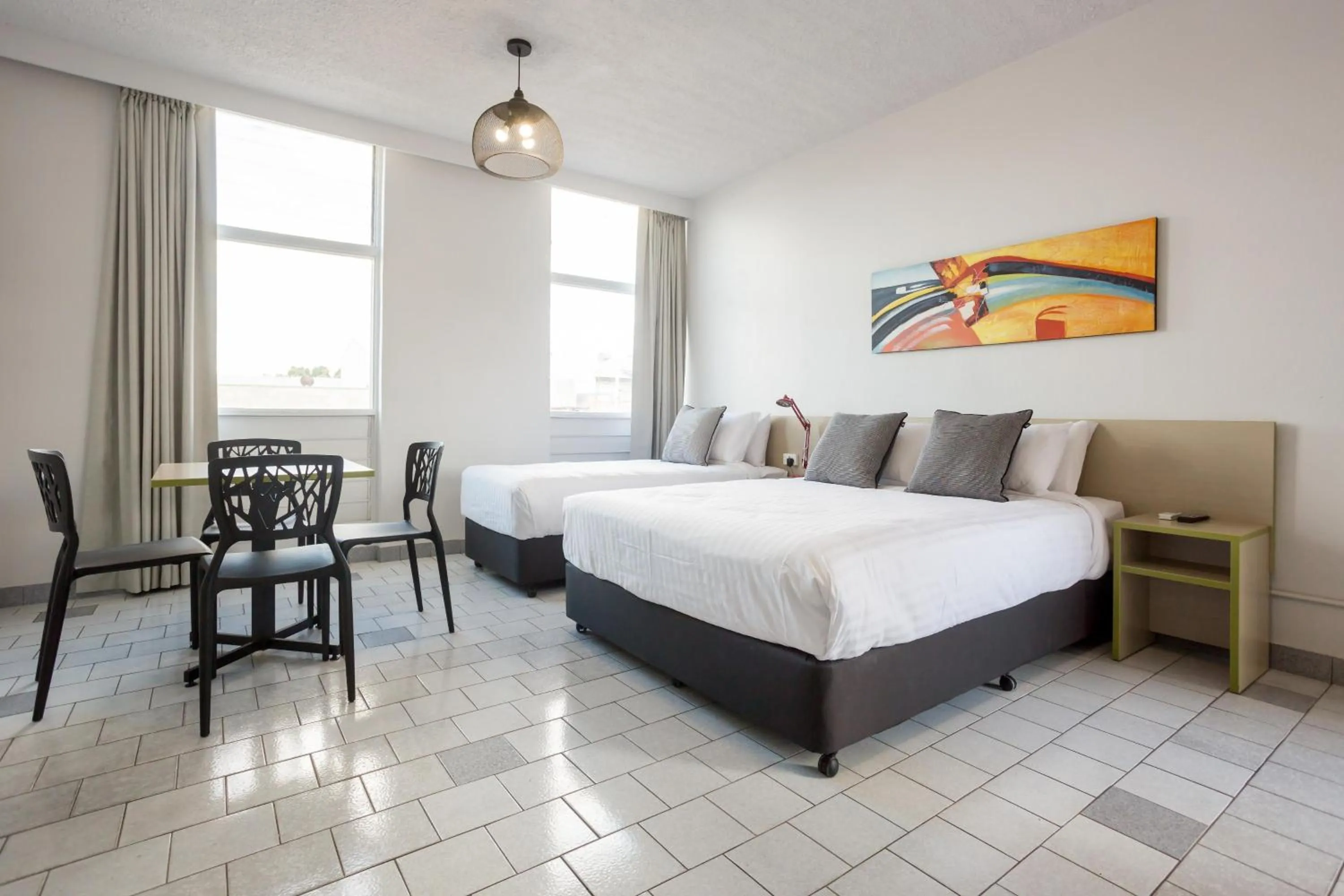 Bedroom, Bed in Nightcap at Emerald Star Hotel