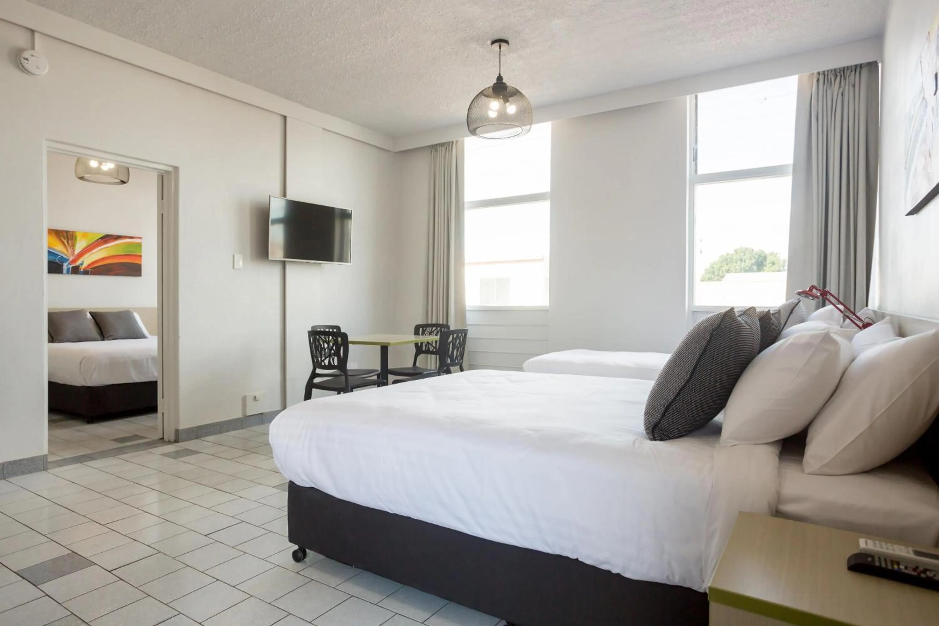 Bedroom, Bed in Nightcap at Emerald Star Hotel