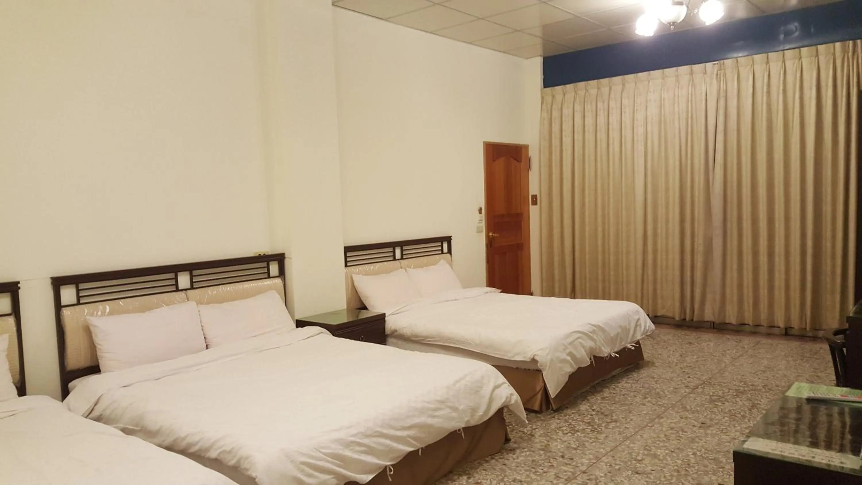 Bed in Ming Yang B&B