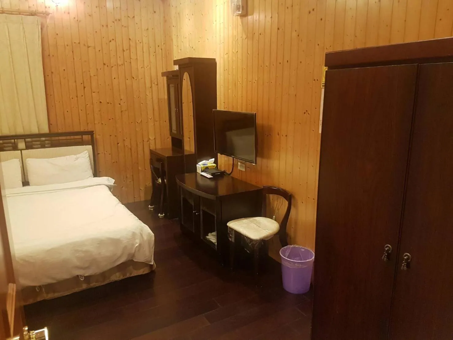 Bed in Ming Yang B&B