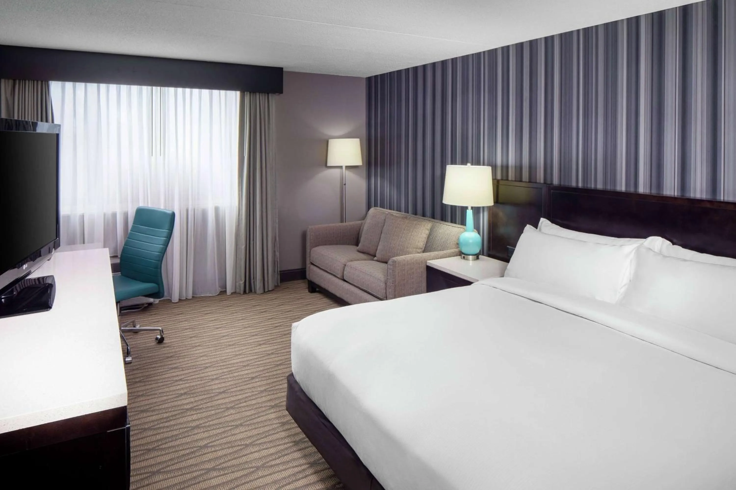 Photo of the whole room, Bed in Wyndham Garden Westlake