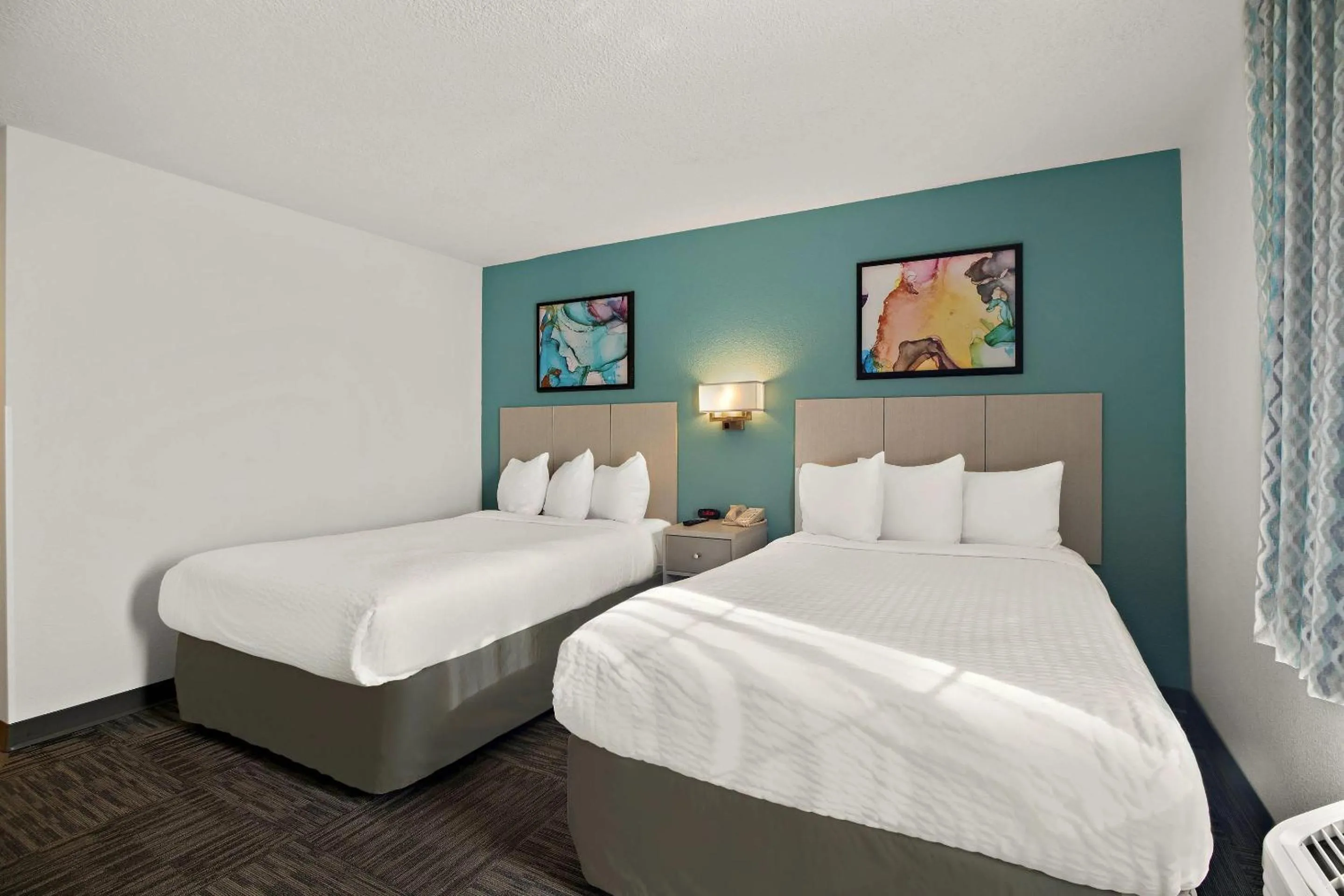 Bedroom, Bed in MainStay Suites Orlando Altamonte Springs