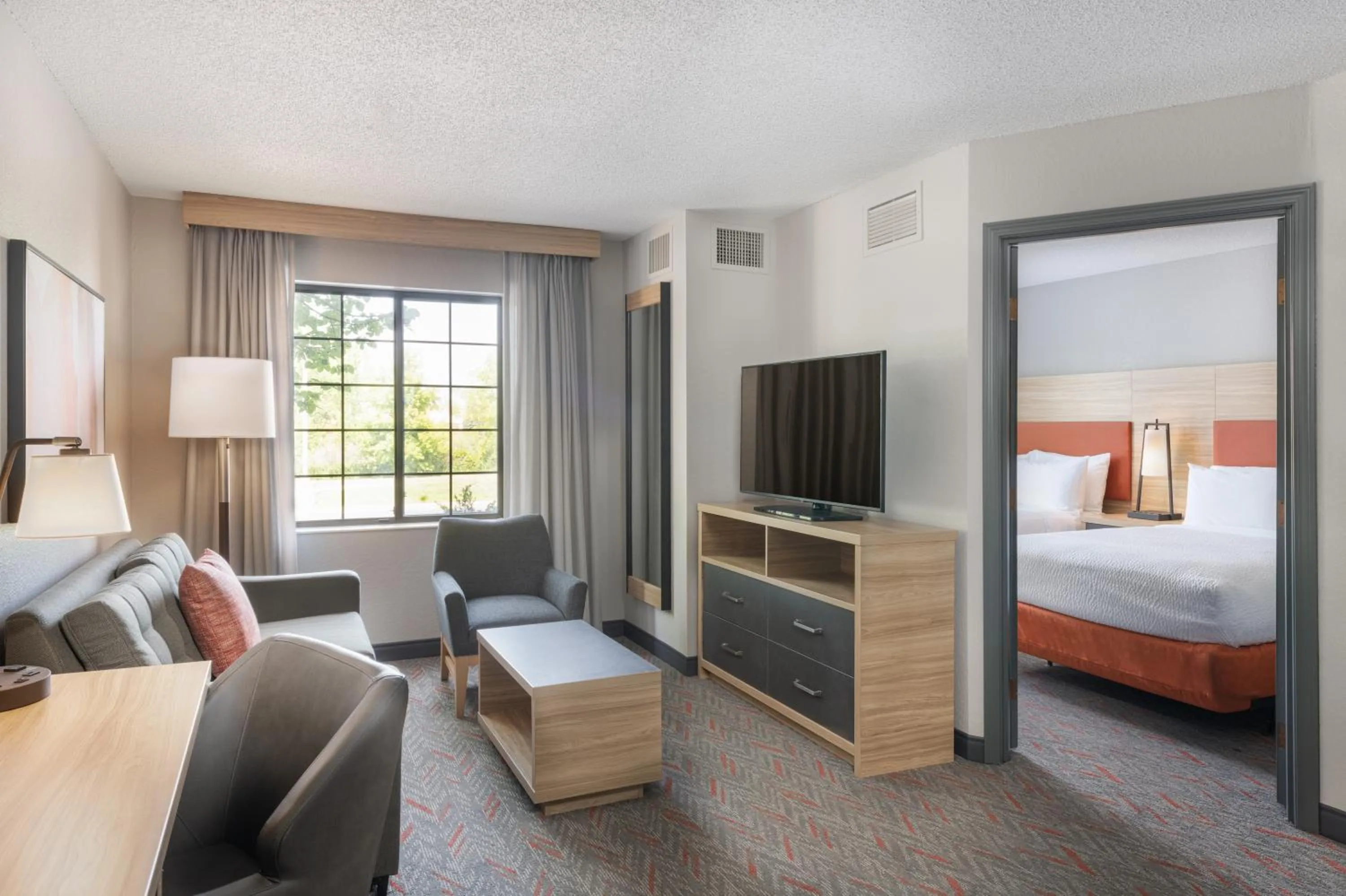Living room, Bed in Candlewood Suites Eagan - Mall of America Area by IHG