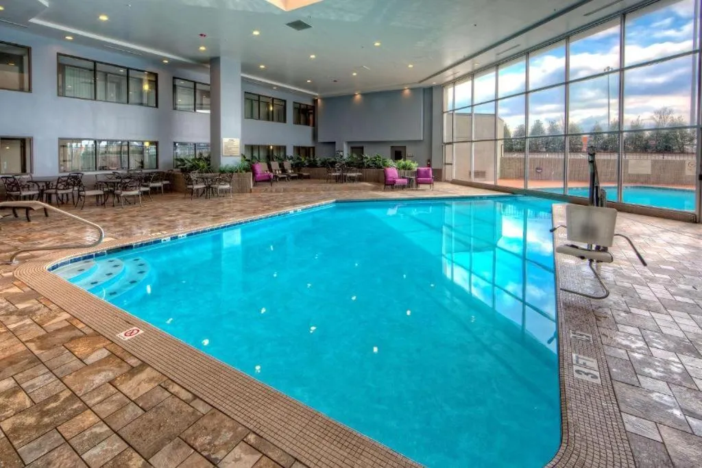 Swimming pool in DoubleTree by Hilton Decatur Riverfront