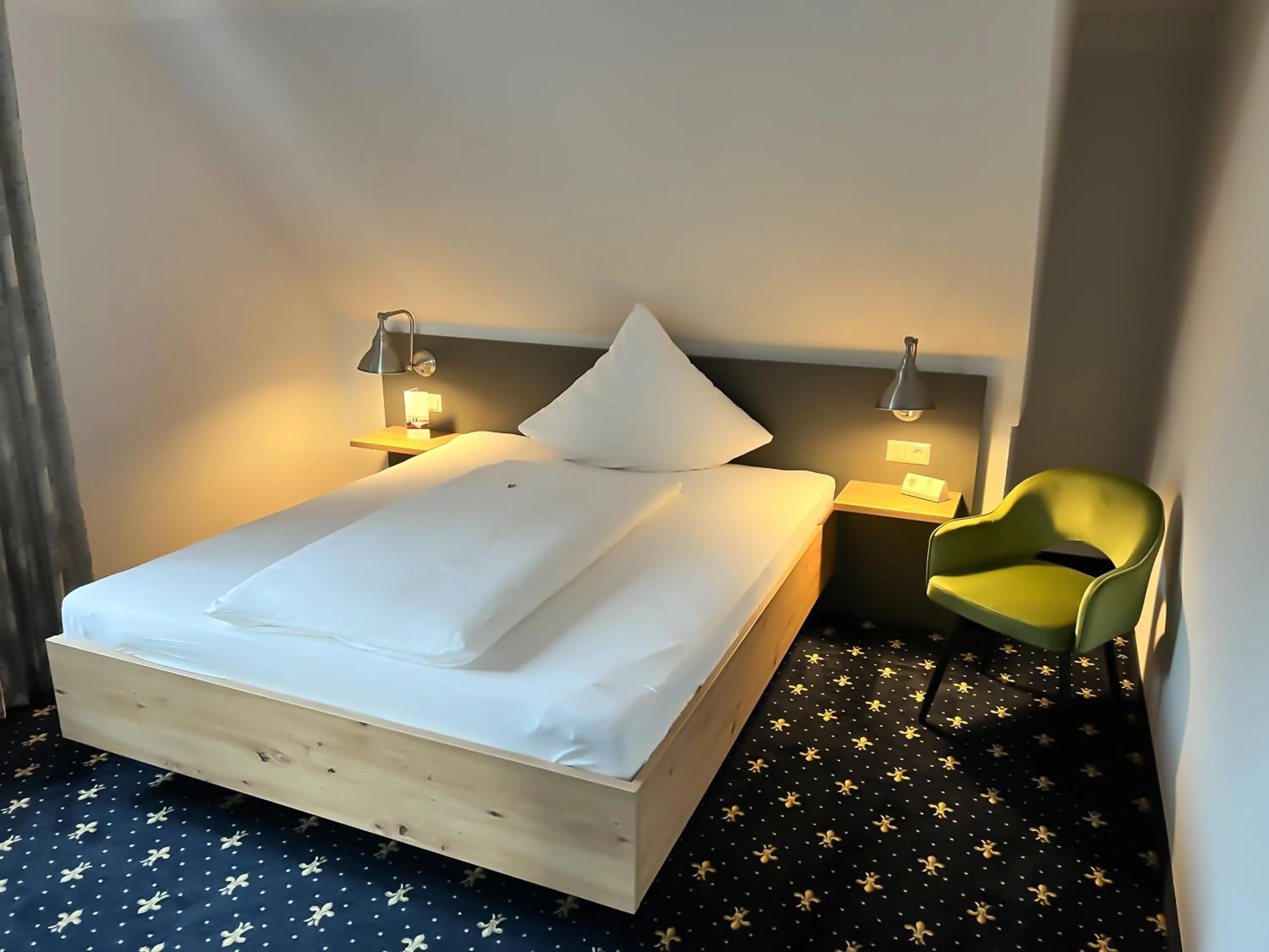 Bed in stadthotel miya