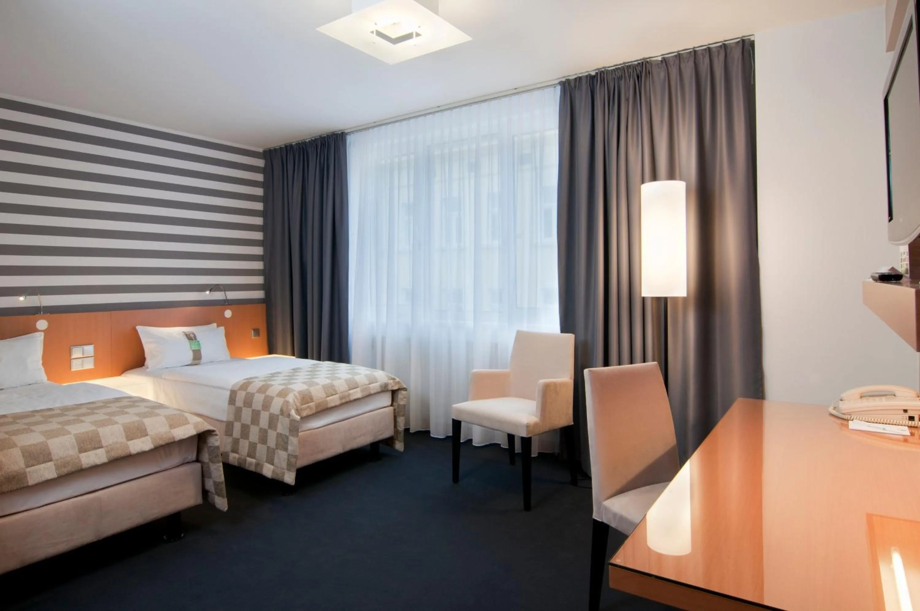 Photo of the whole room, Bed in Holiday Inn Vienna City by IHG