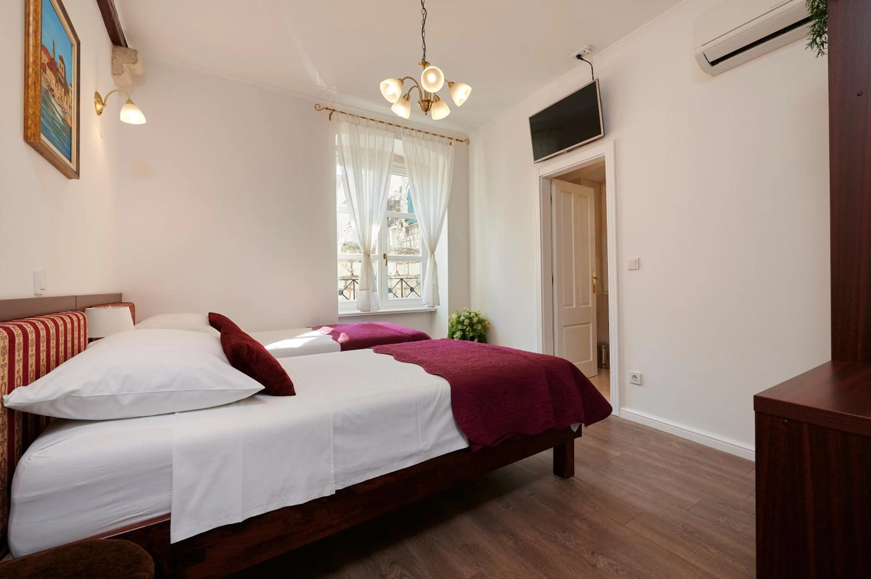 Photo of the whole room, Bed in Palace Central Square