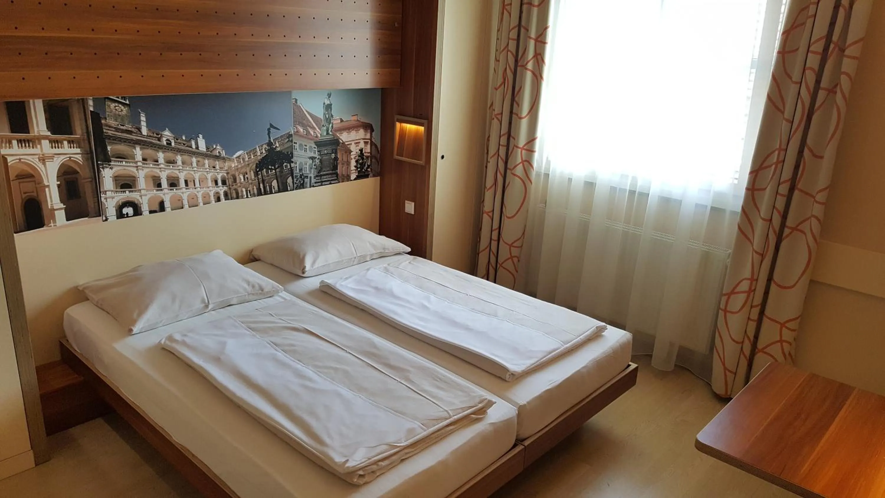 Photo of the whole room, Bed in JUFA Hotel Graz City