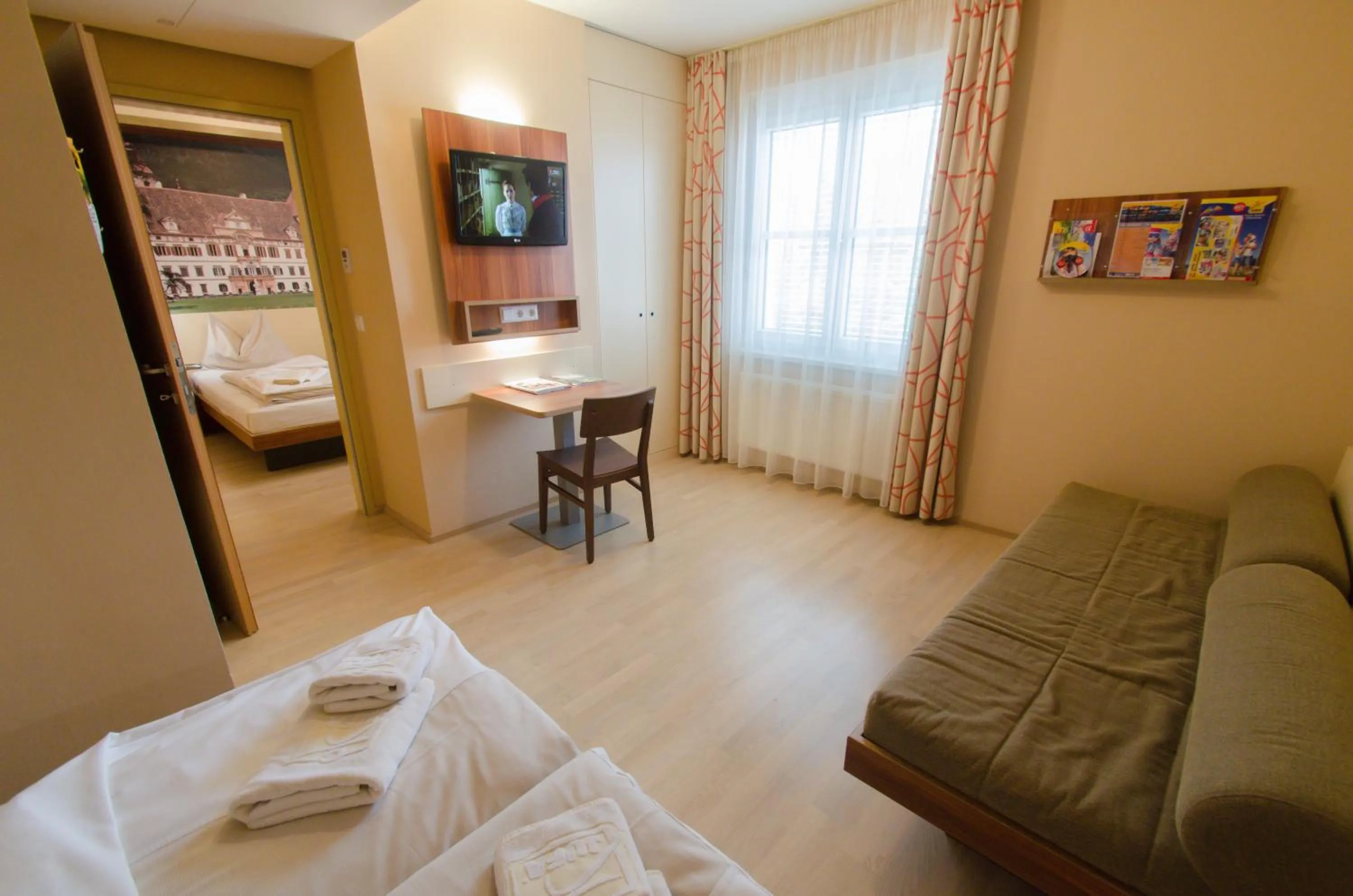 Photo of the whole room, Bed in JUFA Hotel Graz City