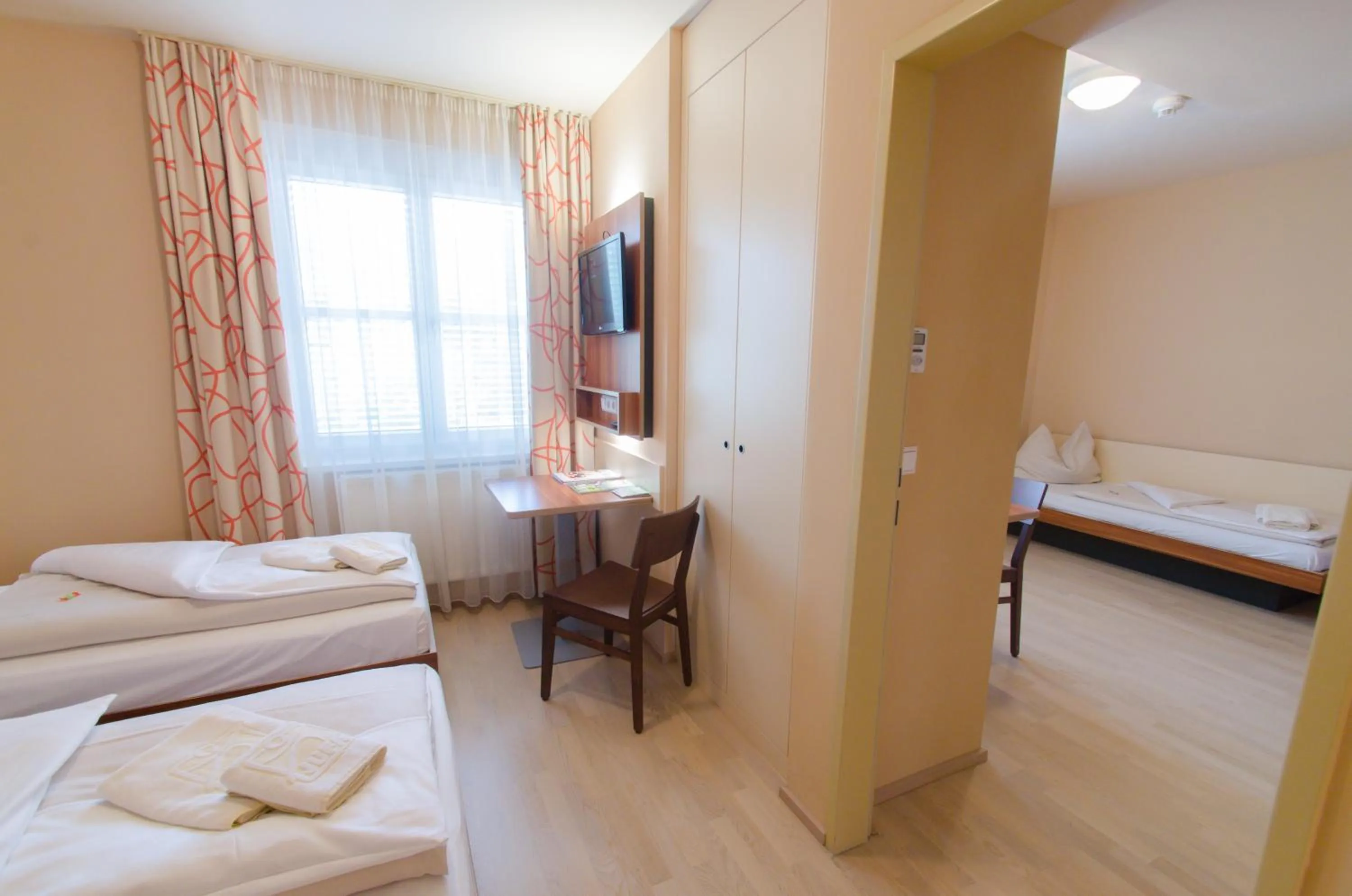 Photo of the whole room, Bed in JUFA Hotel Graz City