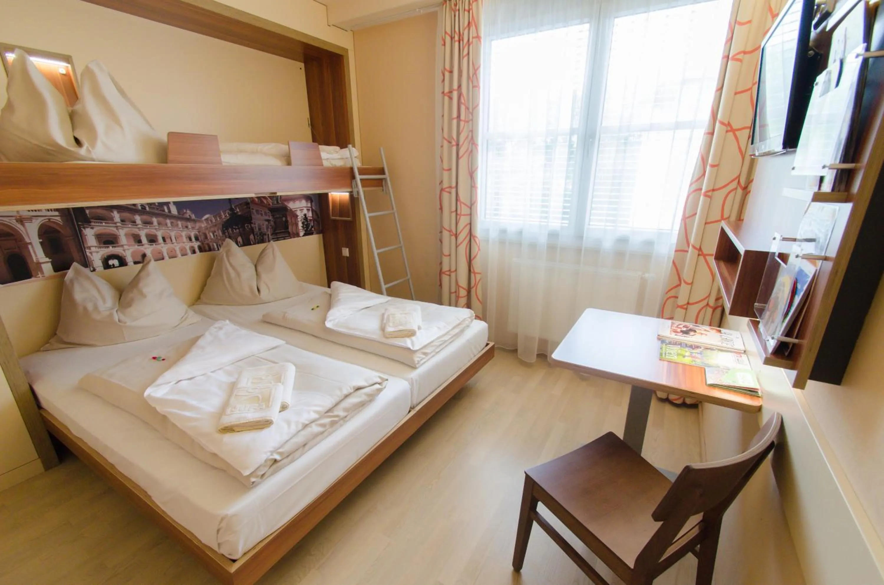 Photo of the whole room, Bed in JUFA Hotel Graz City