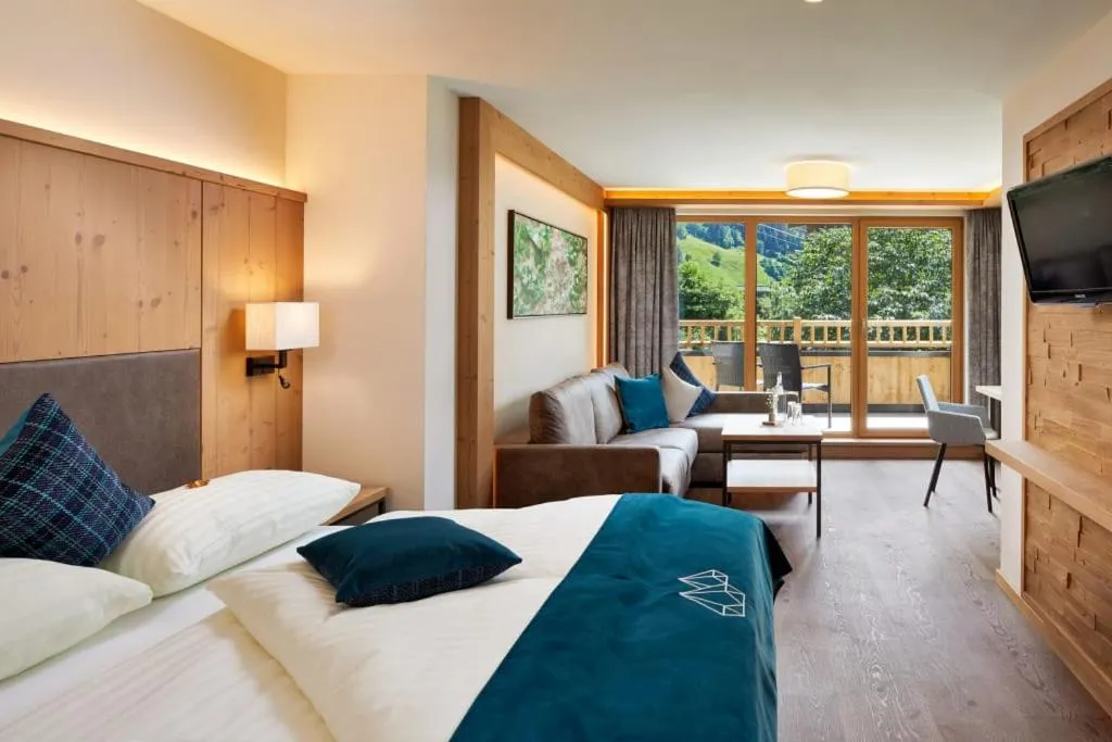 Bed in Smaragdhotel Tauernblick