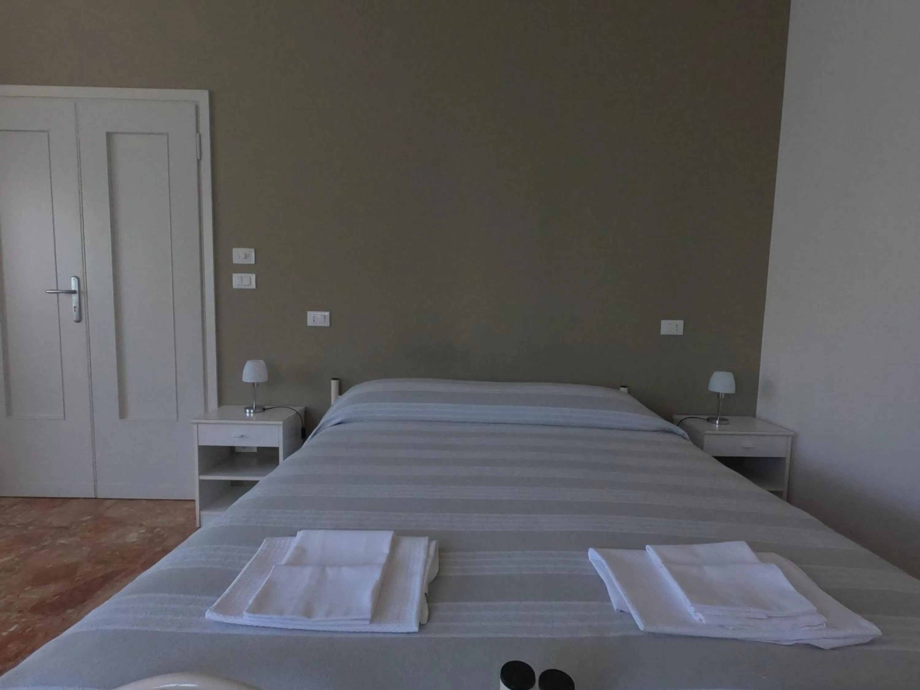 Bed in Gardenia Guest House