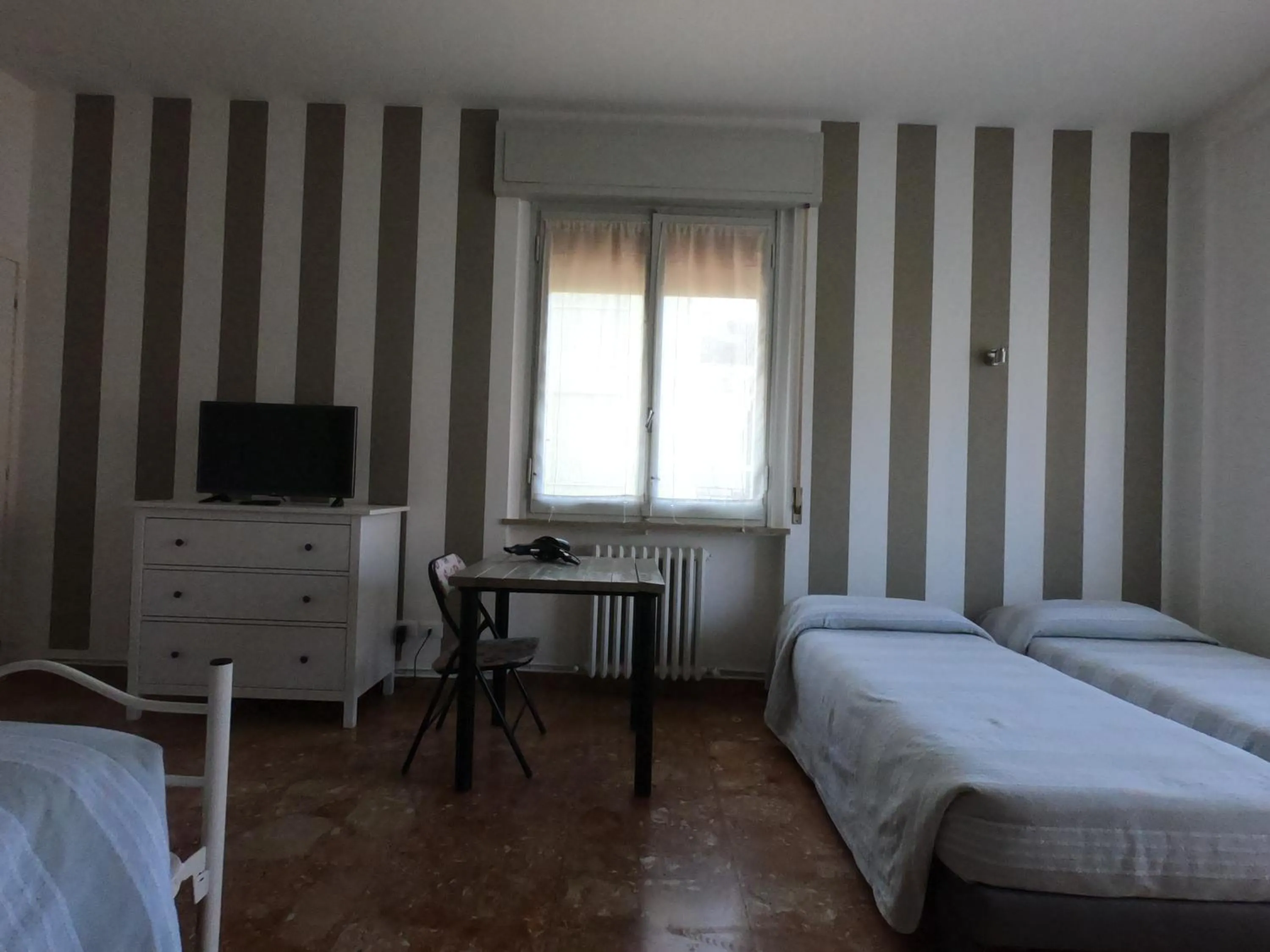 Bed in Gardenia Guest House