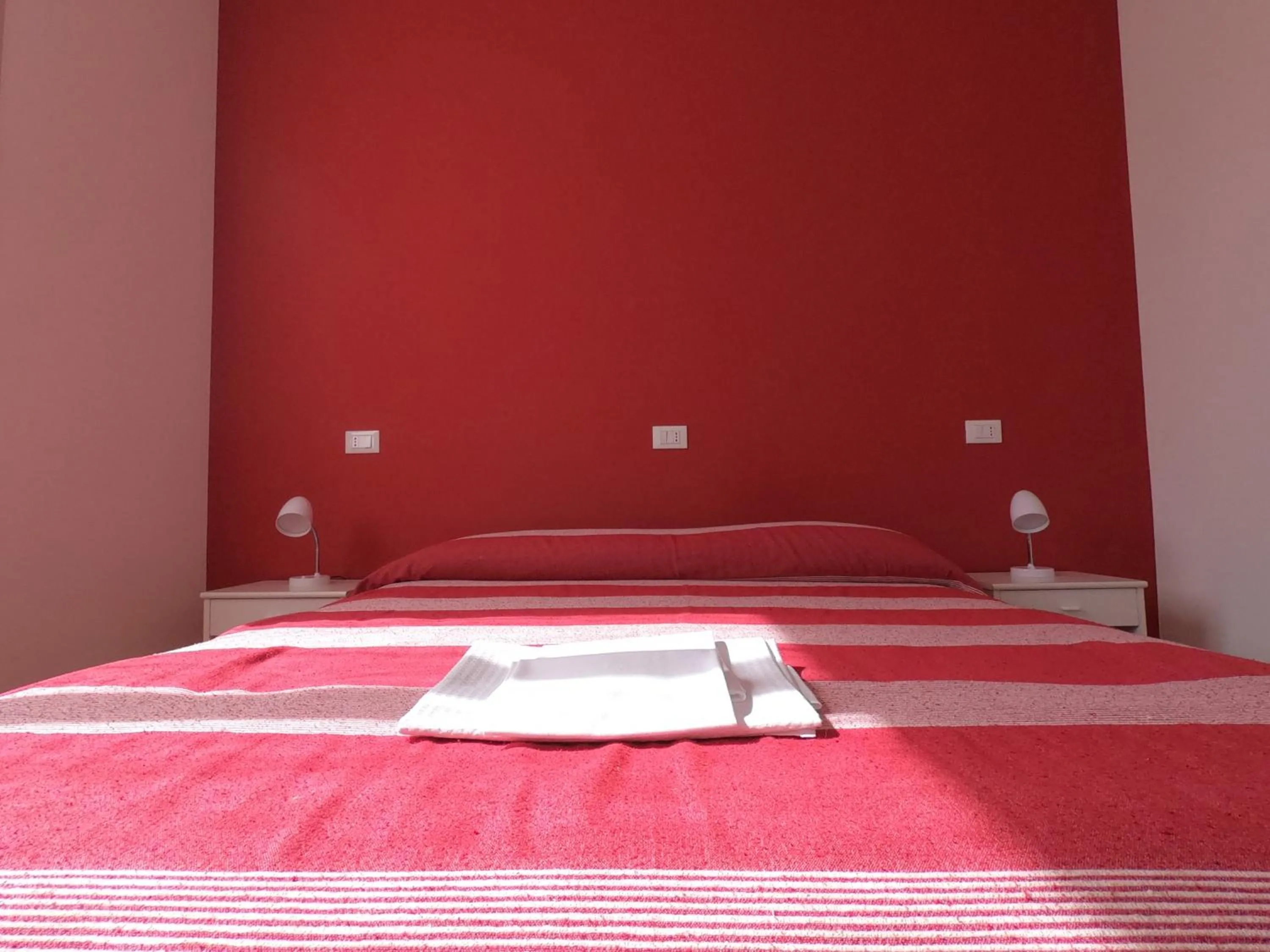 Bed in Gardenia Guest House