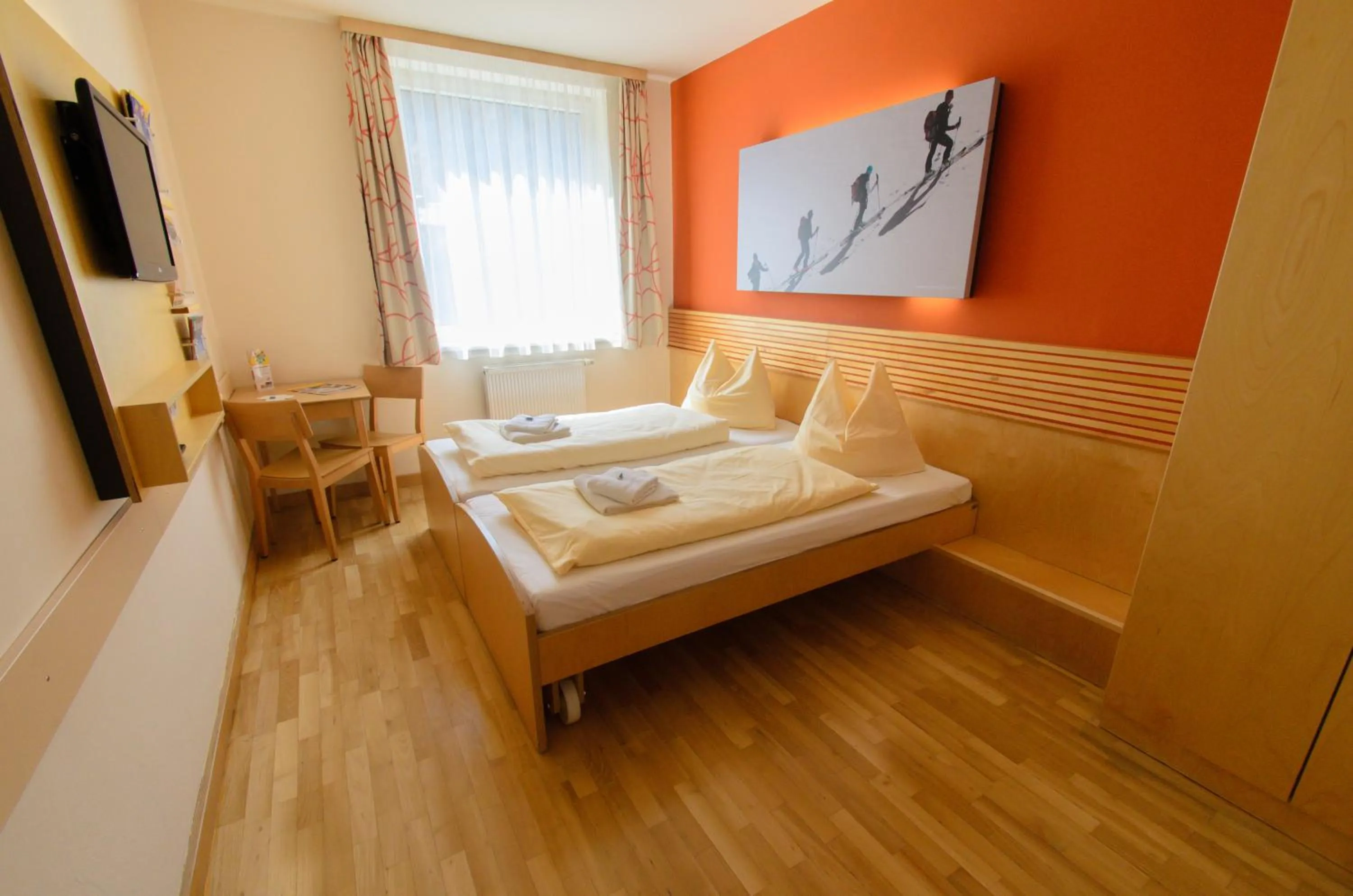 Photo of the whole room, Bed in JUFA Hotel Schladming