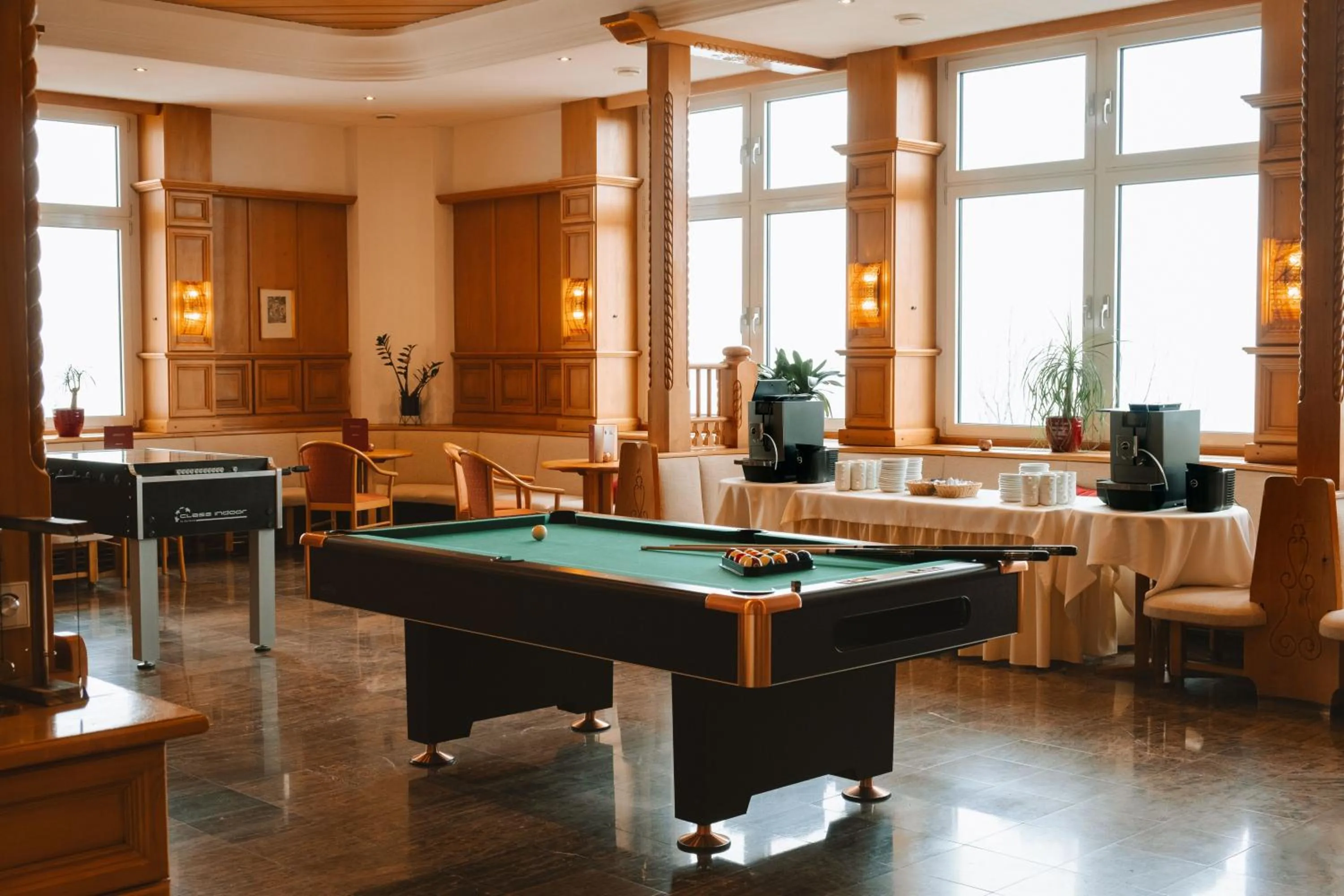 Communal lounge/ TV room in Sporthotel am Semmering