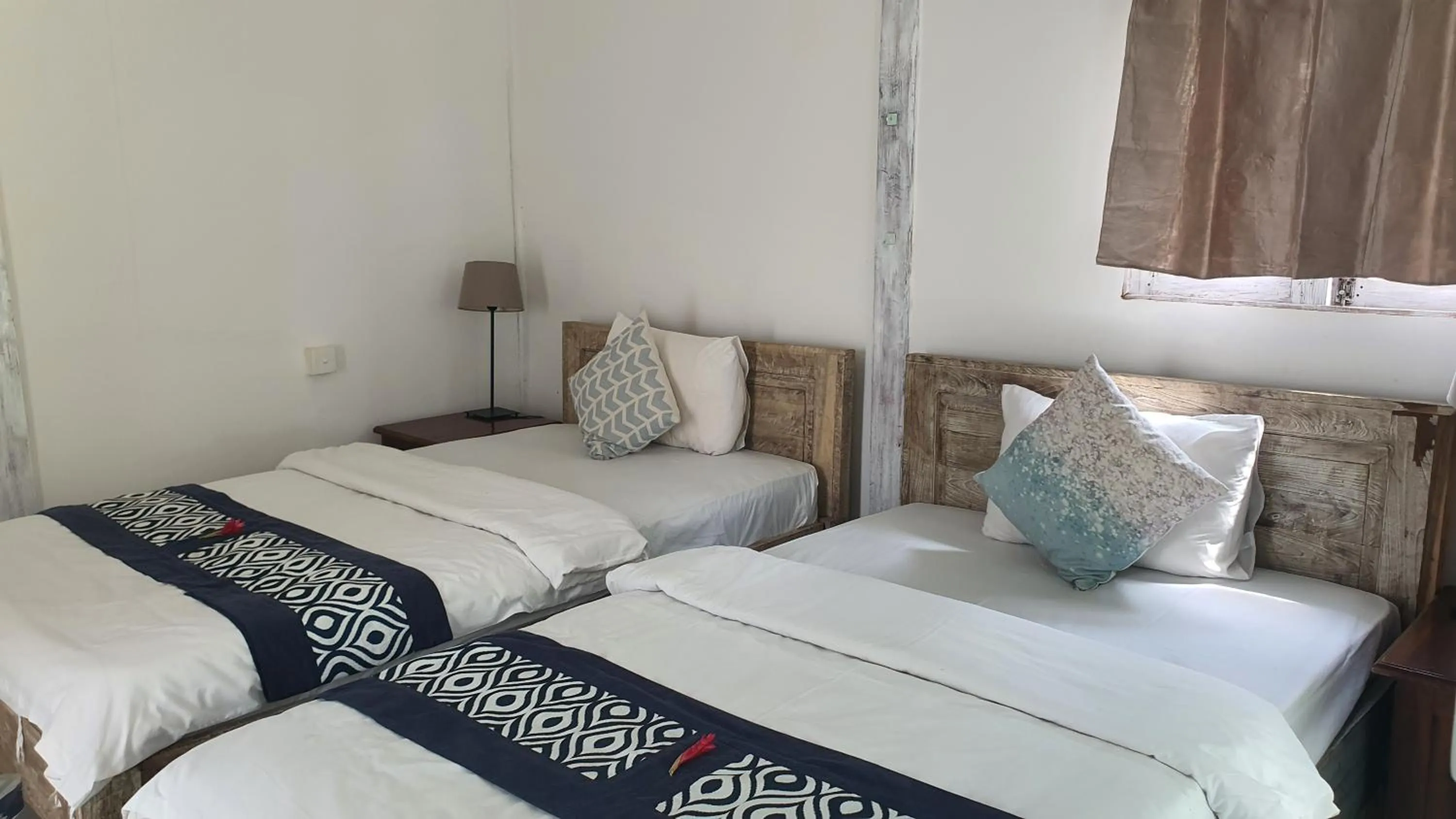 Bed in Myamo Beach Lodge