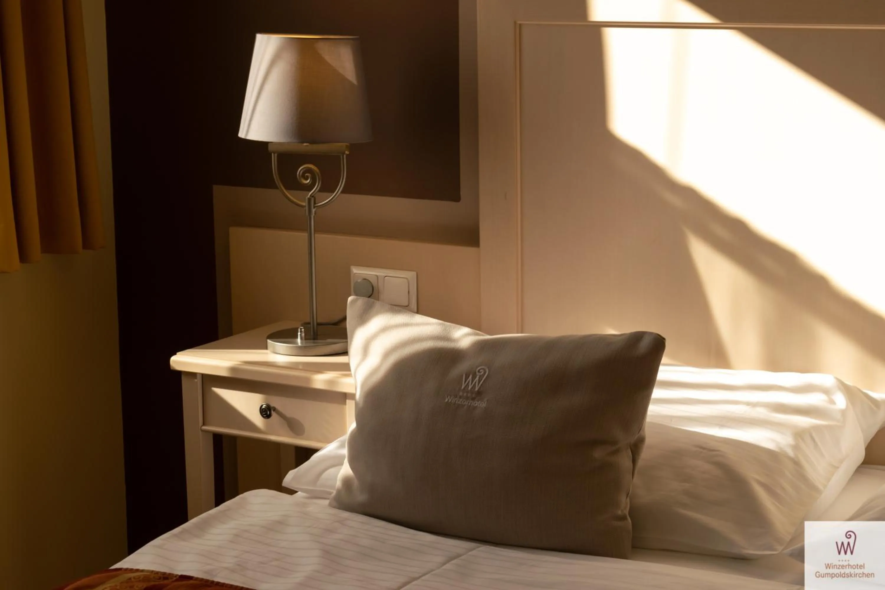 Bed in Winzerhotel Gumpoldskirchen