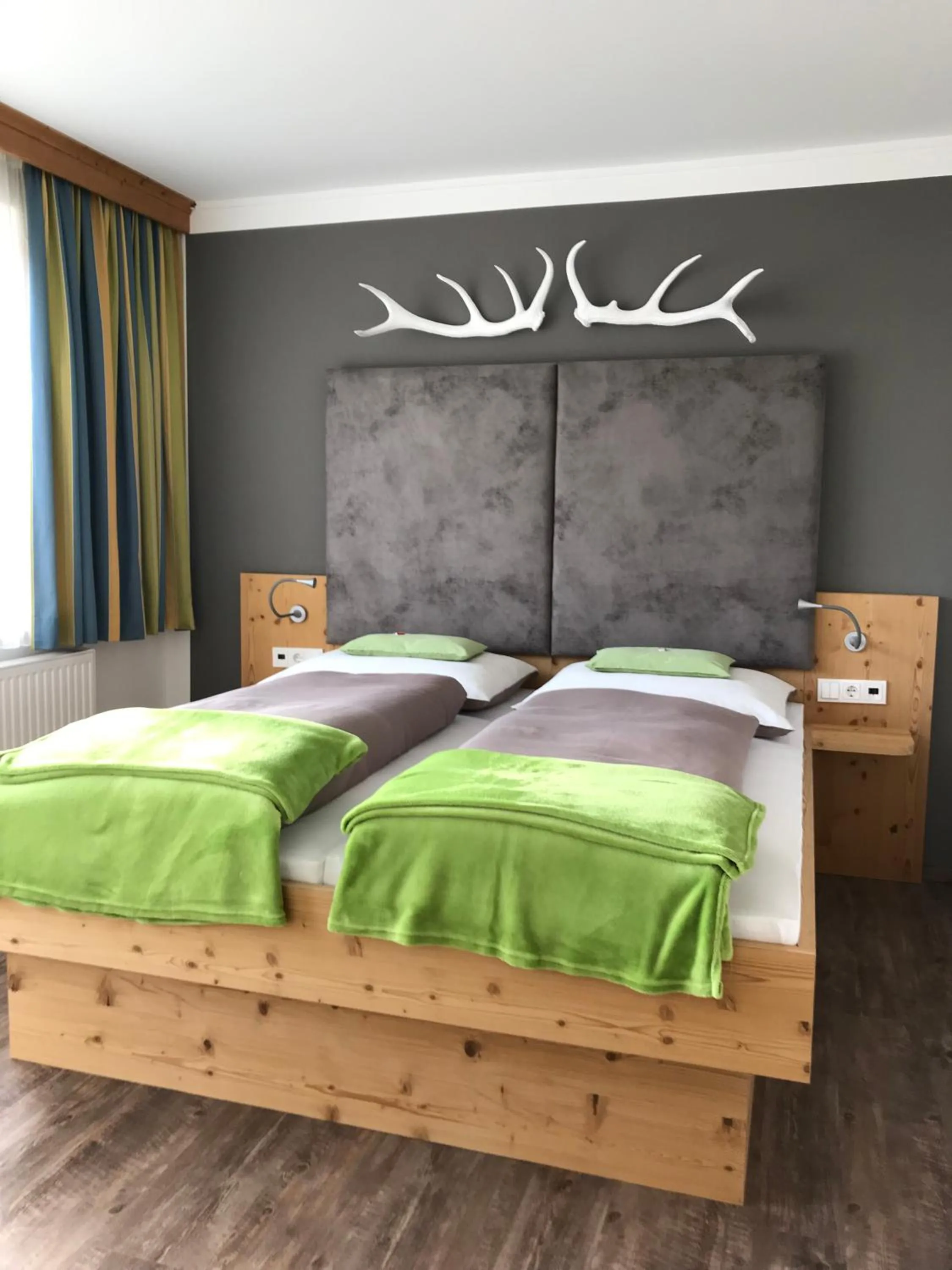 Bed in Comfort Hotel Garni Landhaus Gitti