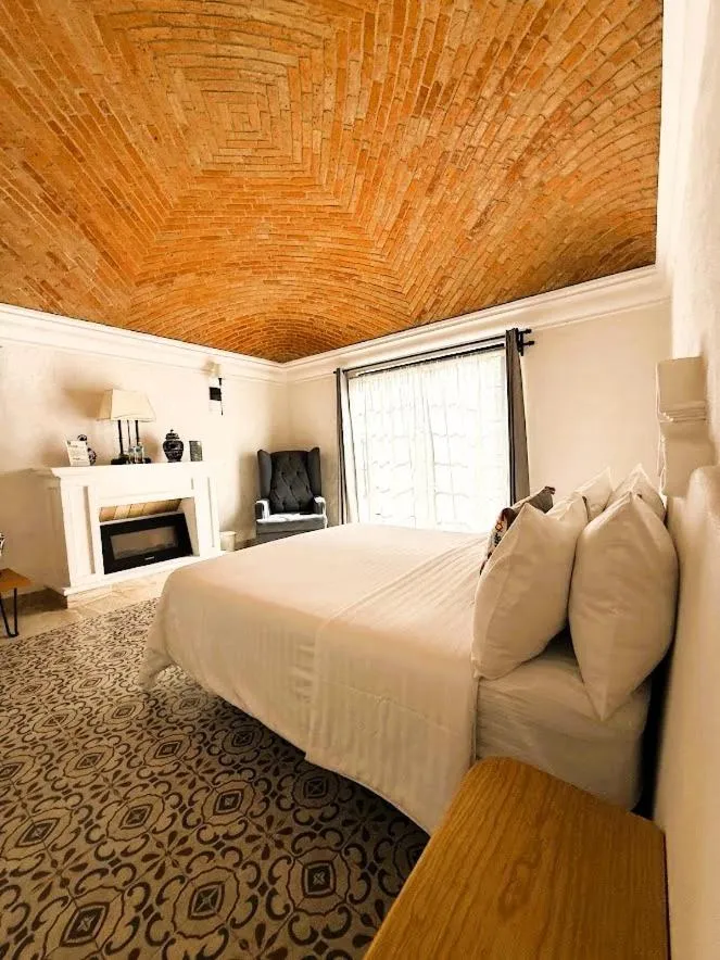 Photo of the whole room, Bed in Hacienda San Patricio