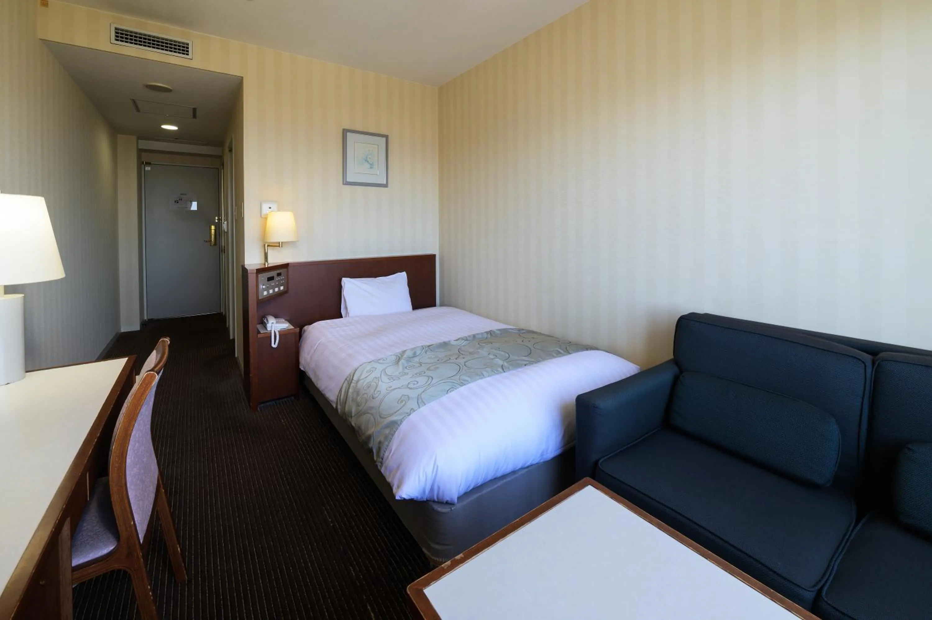 Bed in Hotel Aomori