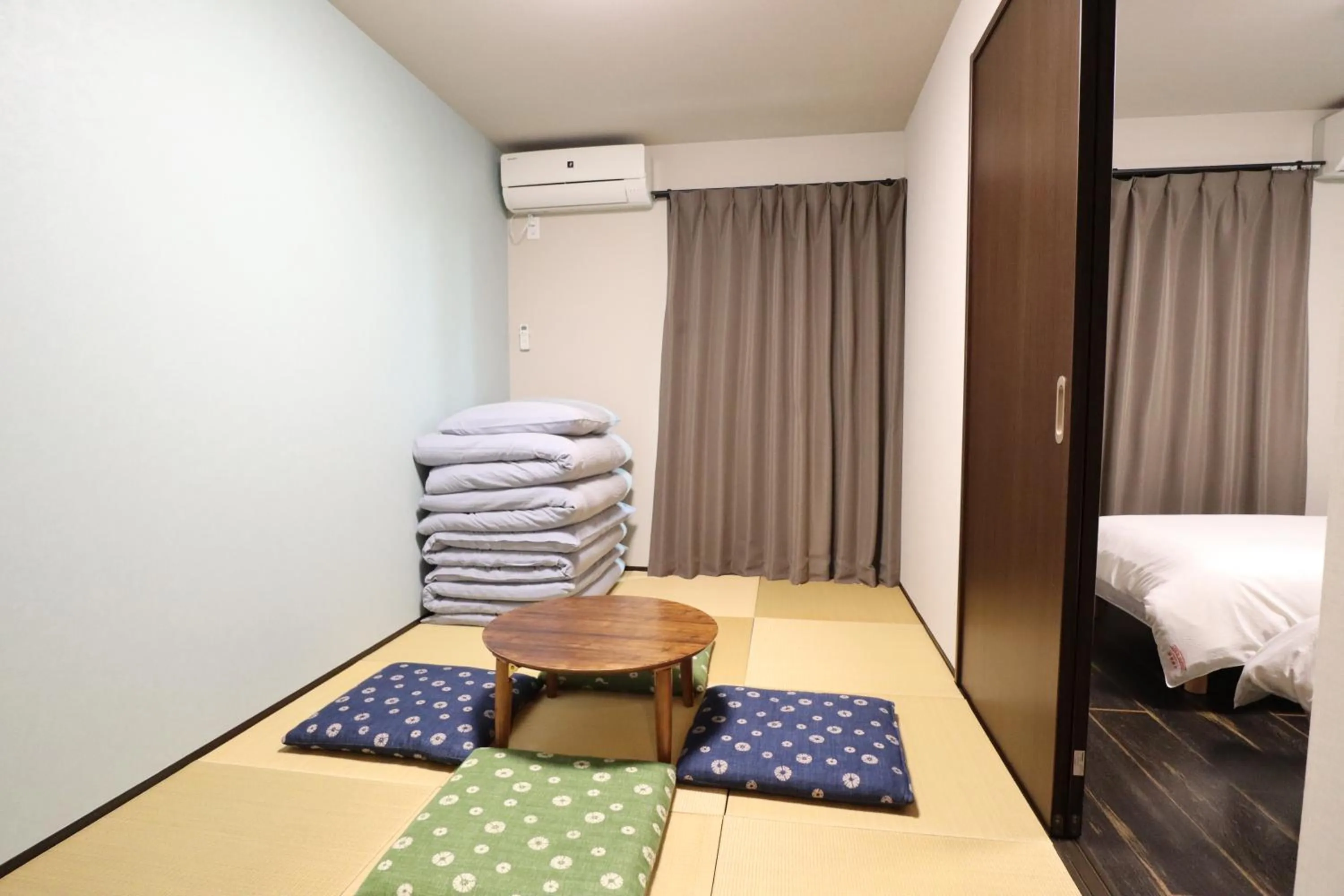 Bed in Kyostay Iroha Toji Annex