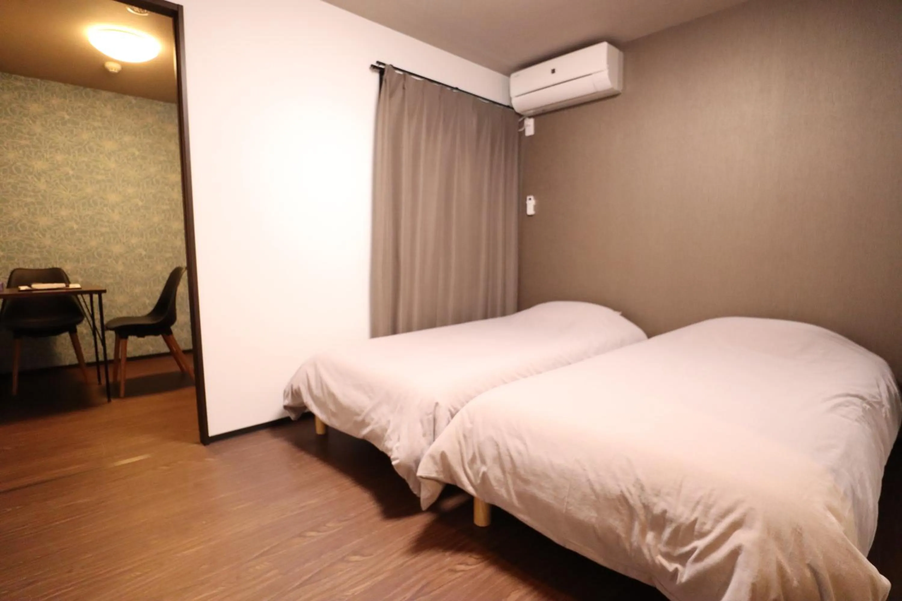 Bed in Kyostay Iroha Toji Annex