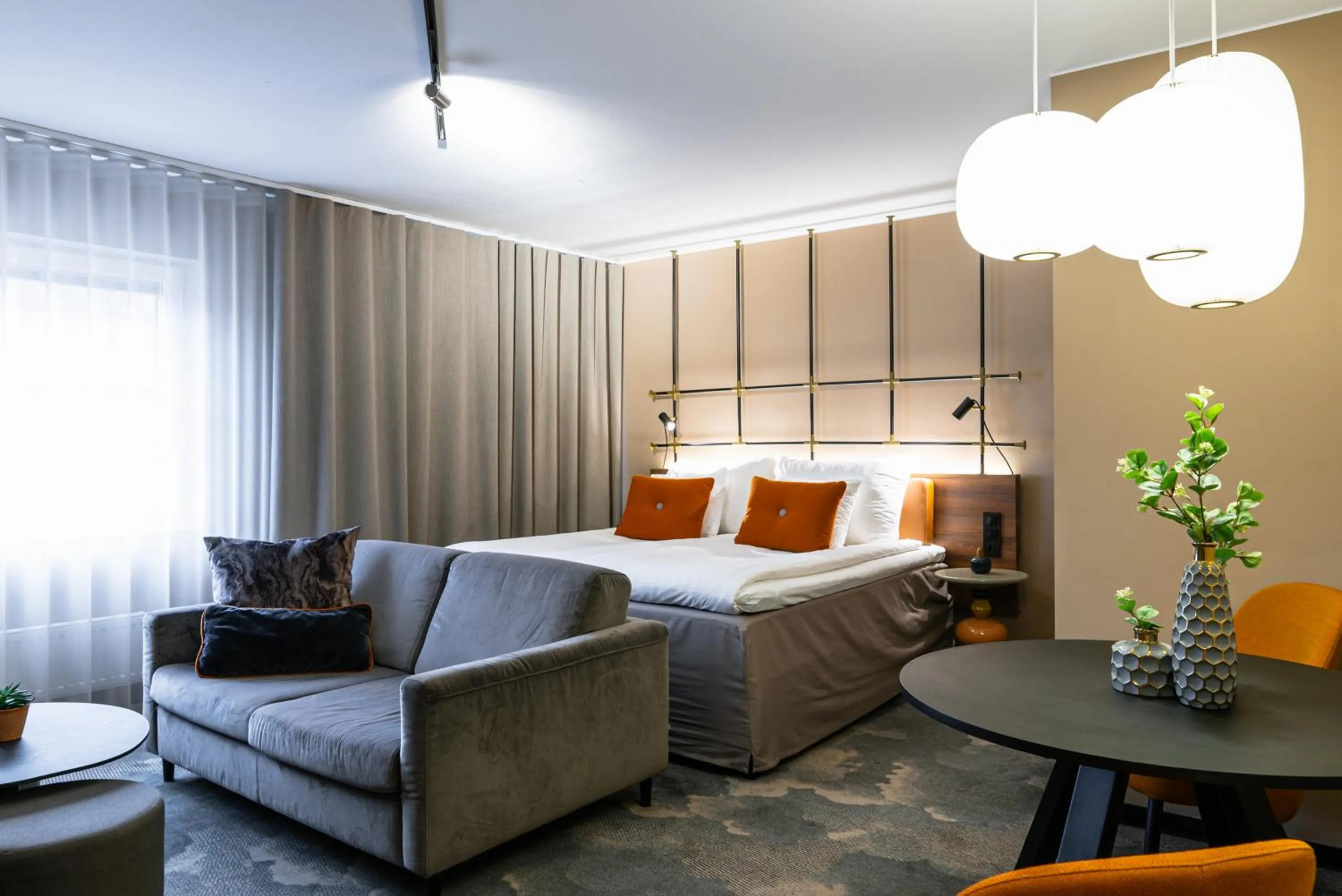 Communal lounge/ TV room, Bed in Clarion Hotel Winn