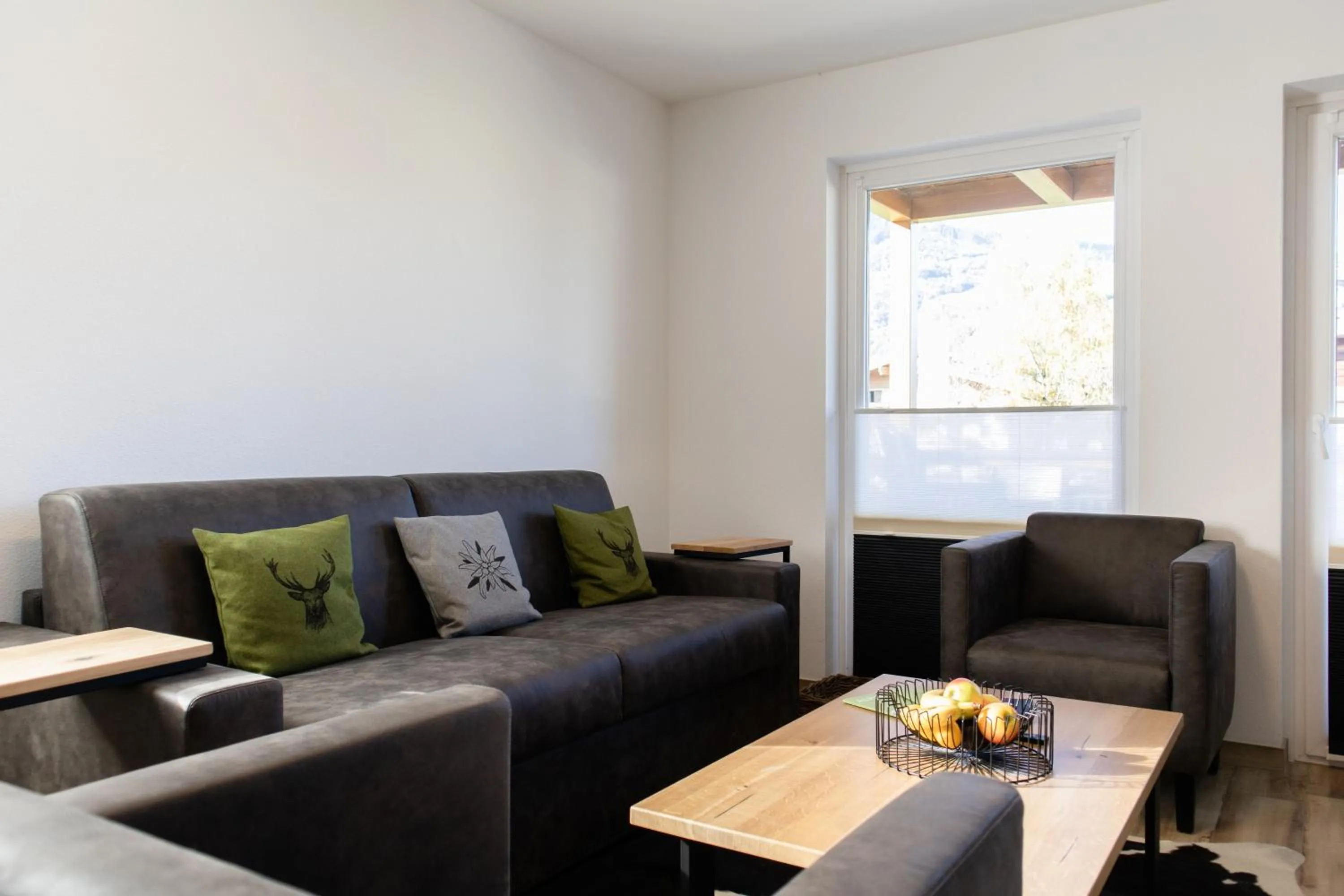 Living room in AvenidA Style Appartements by Alpin Rentals