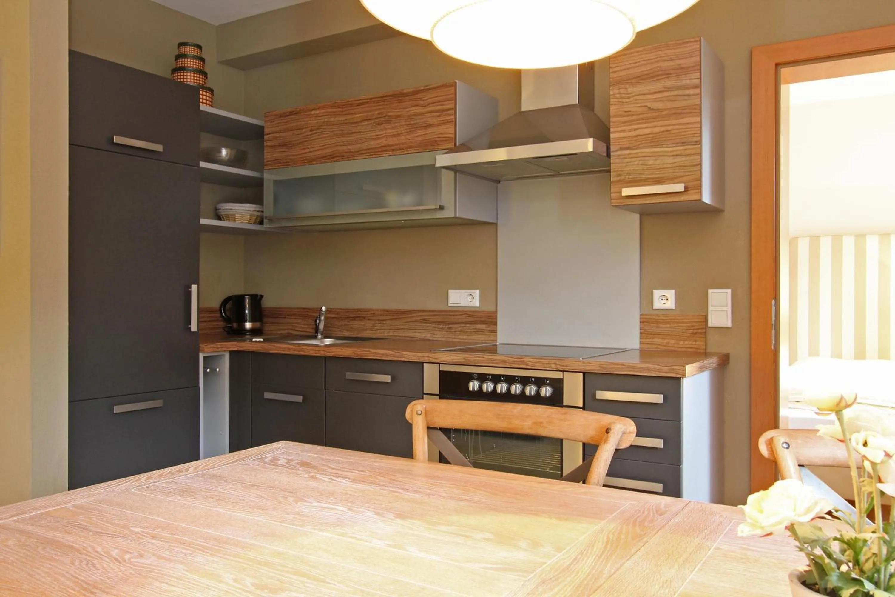 Kitchen or kitchenette in AvenidA Style Appartements by Alpin Rentals