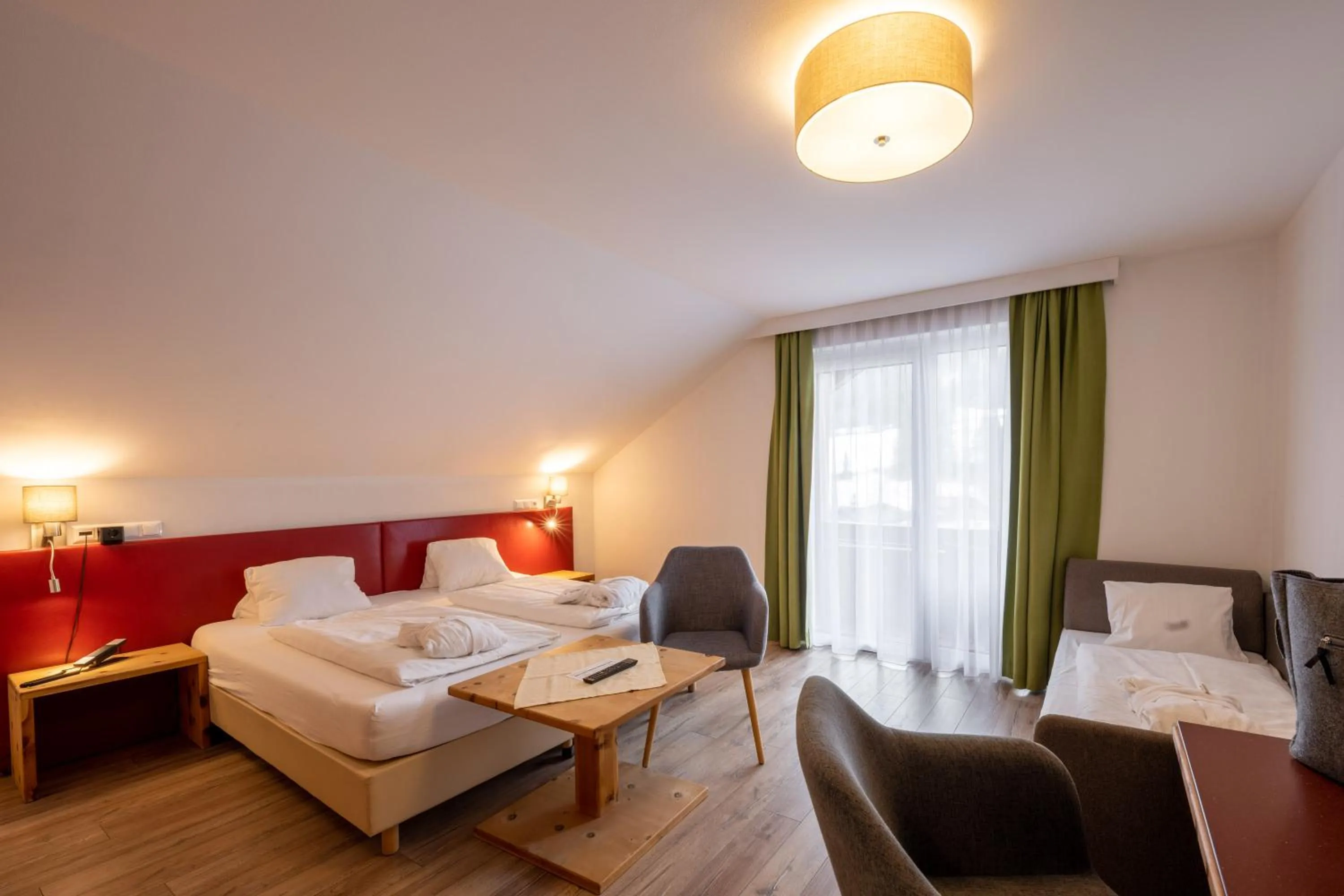 Bathroom, Bed in Genusshotel Almrausch