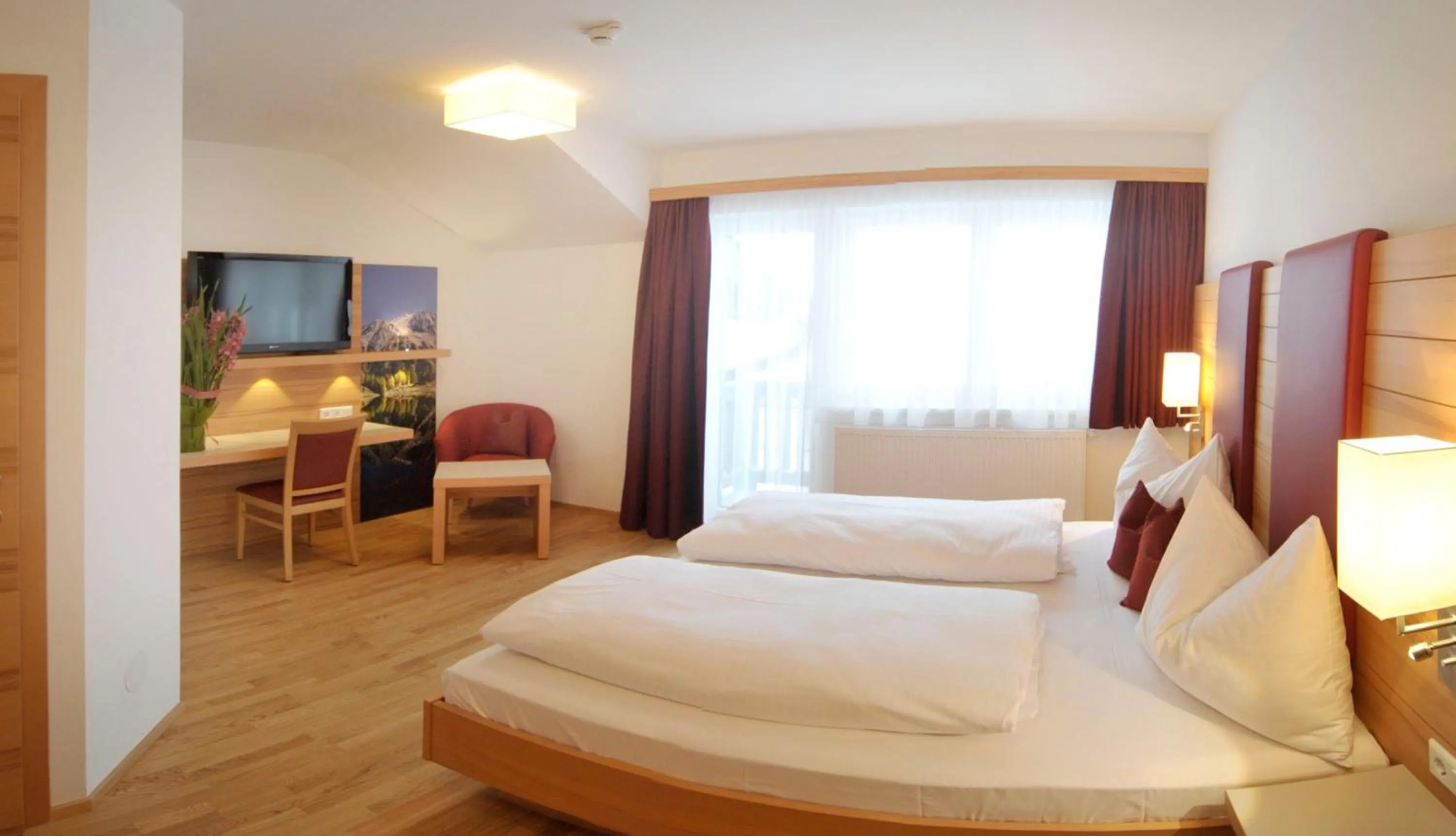 Bed in Hotel Sonnschupfer