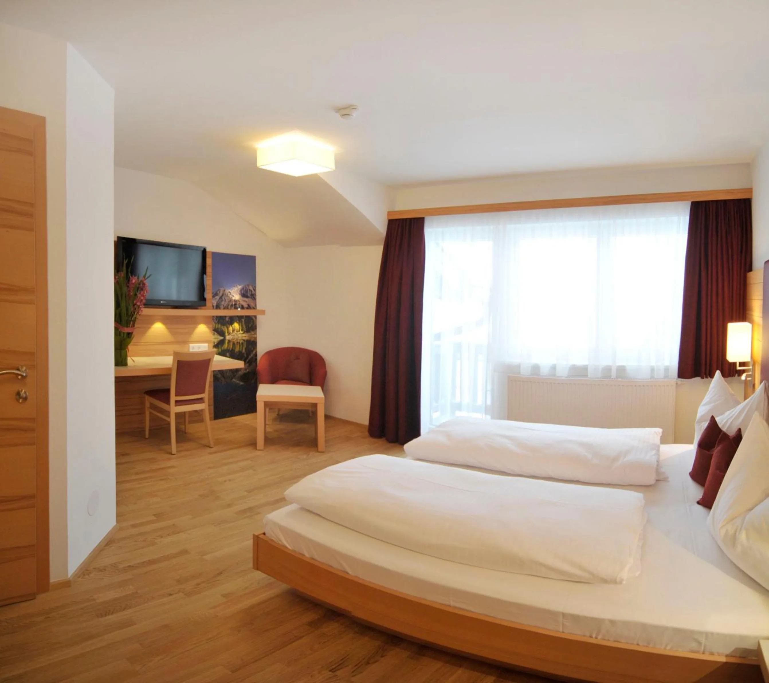 Bed in Hotel Sonnschupfer