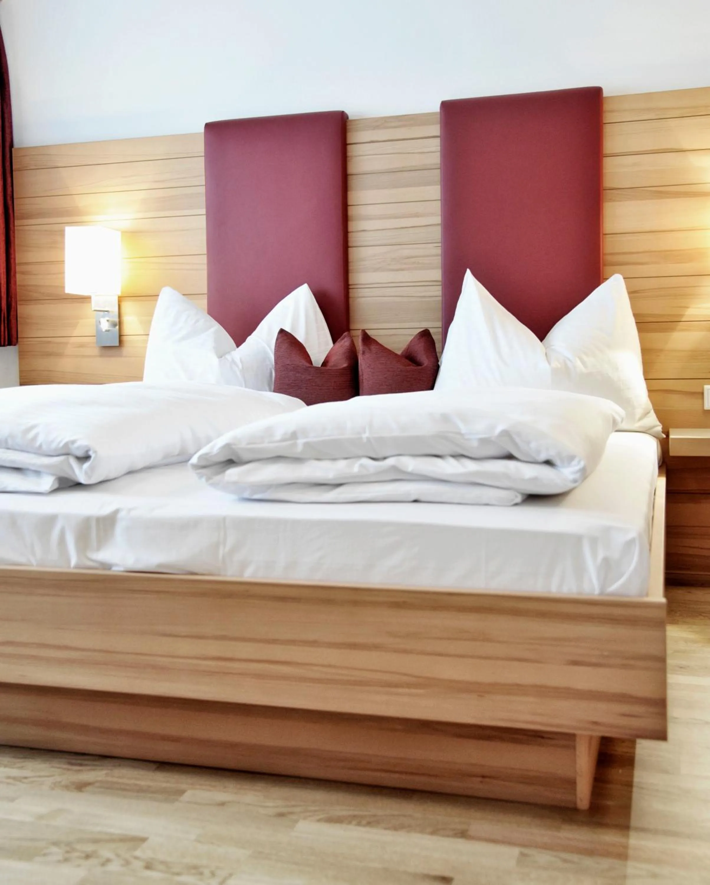 Bed in Hotel Sonnschupfer