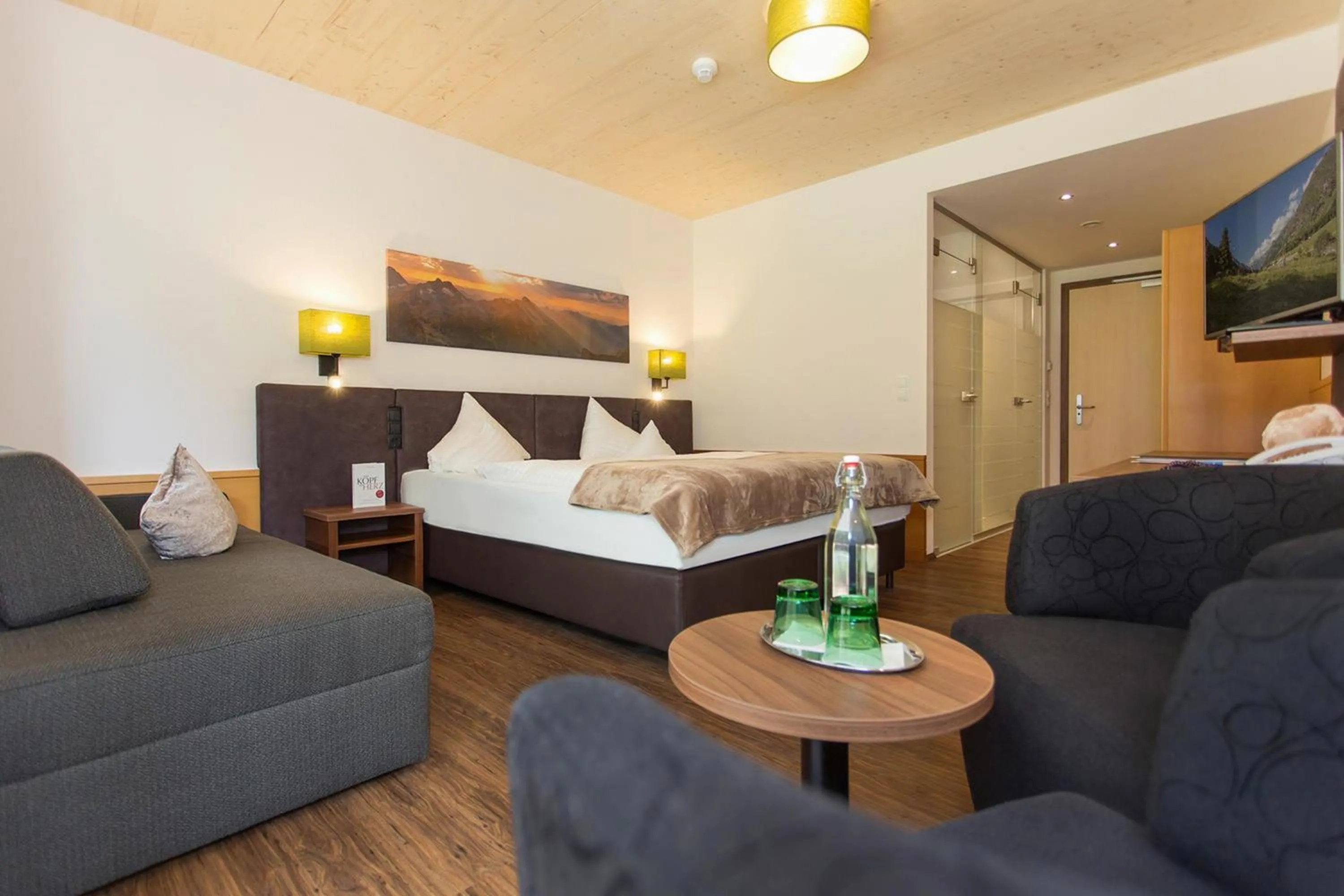 Photo of the whole room, Bed in DAS VIER Sport,- und Wellnesshotel