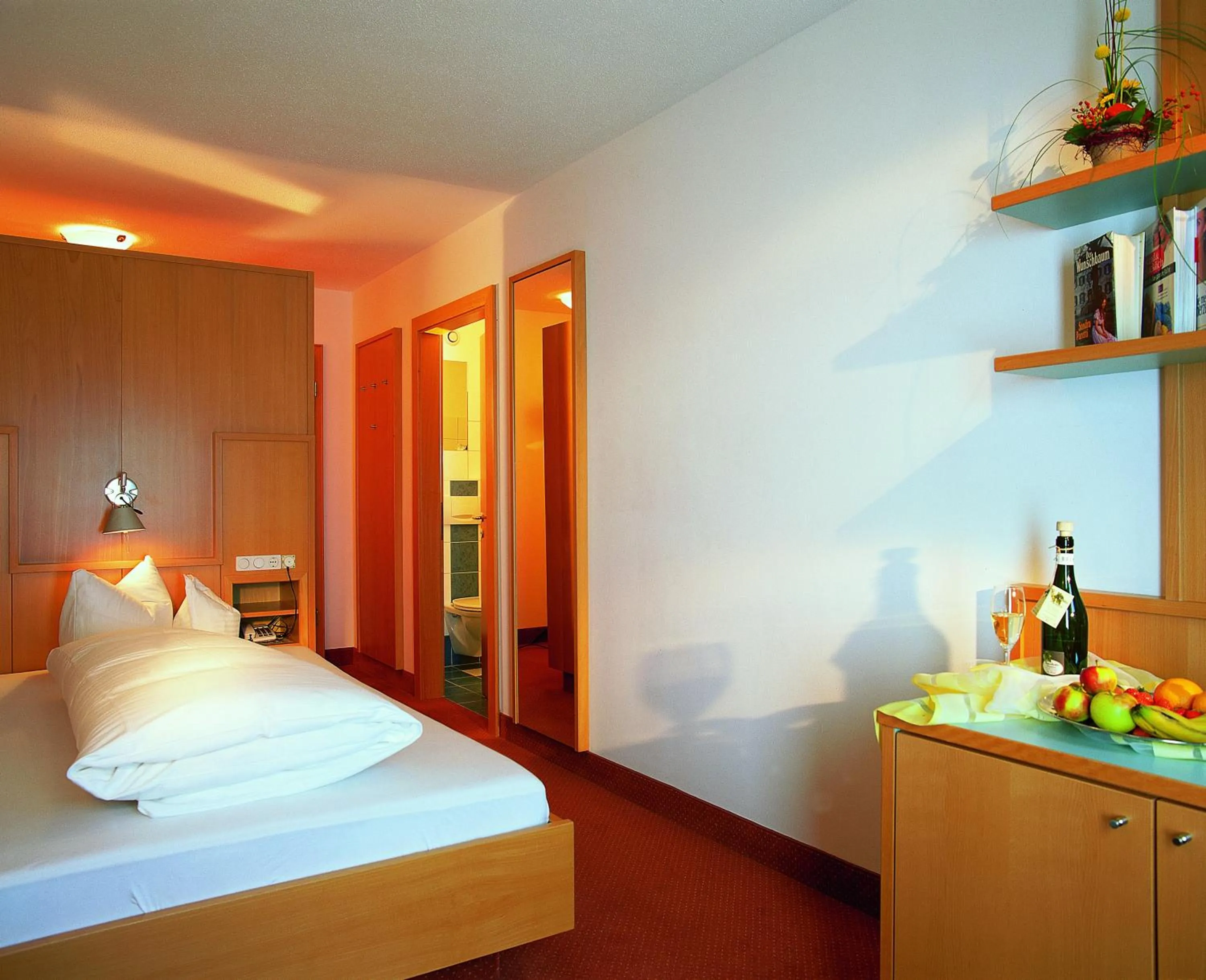 Bed in Hotel Vier Jahreszeiten