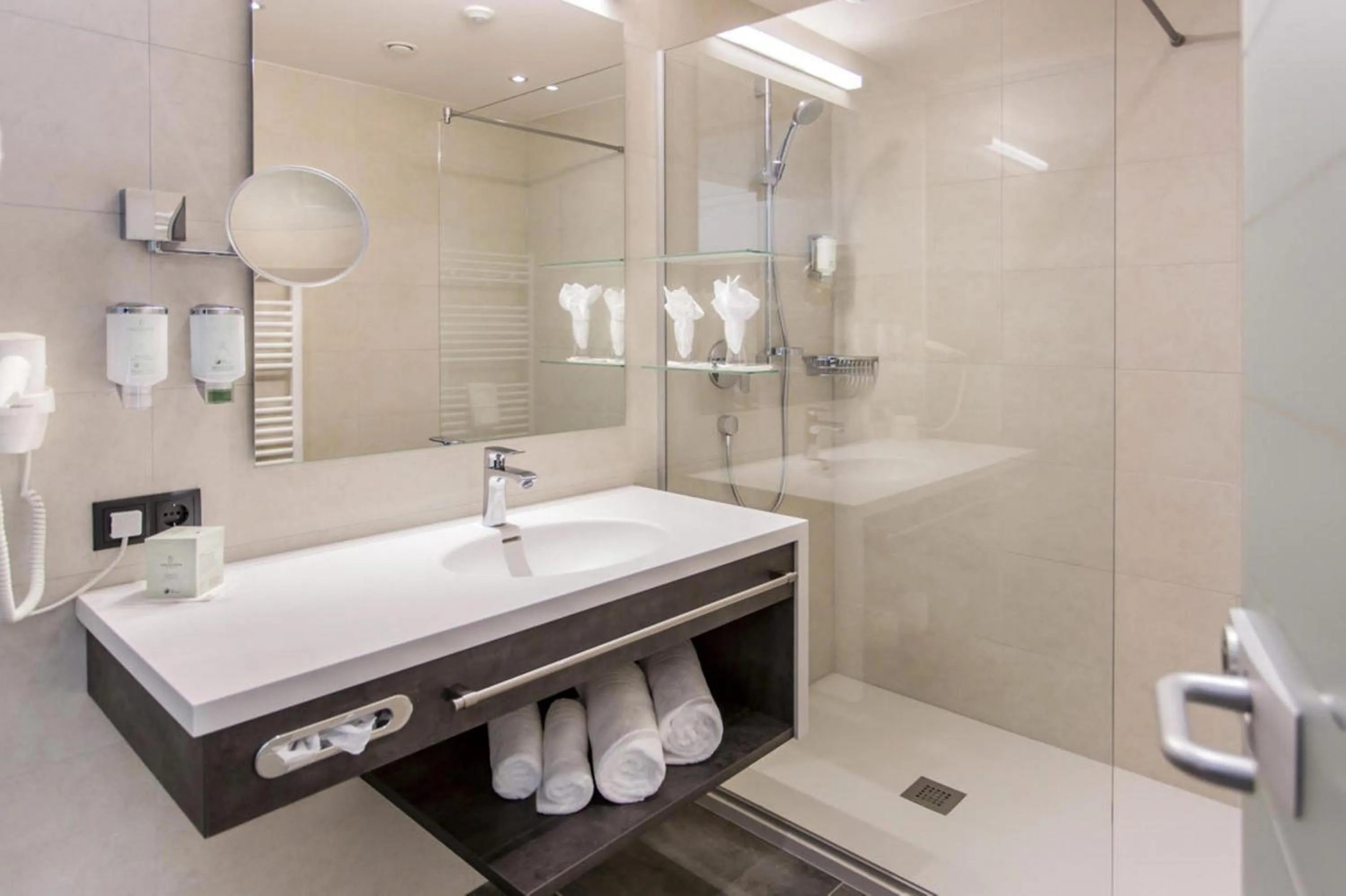 Bathroom in DAS VIER Sport,- und Wellnesshotel