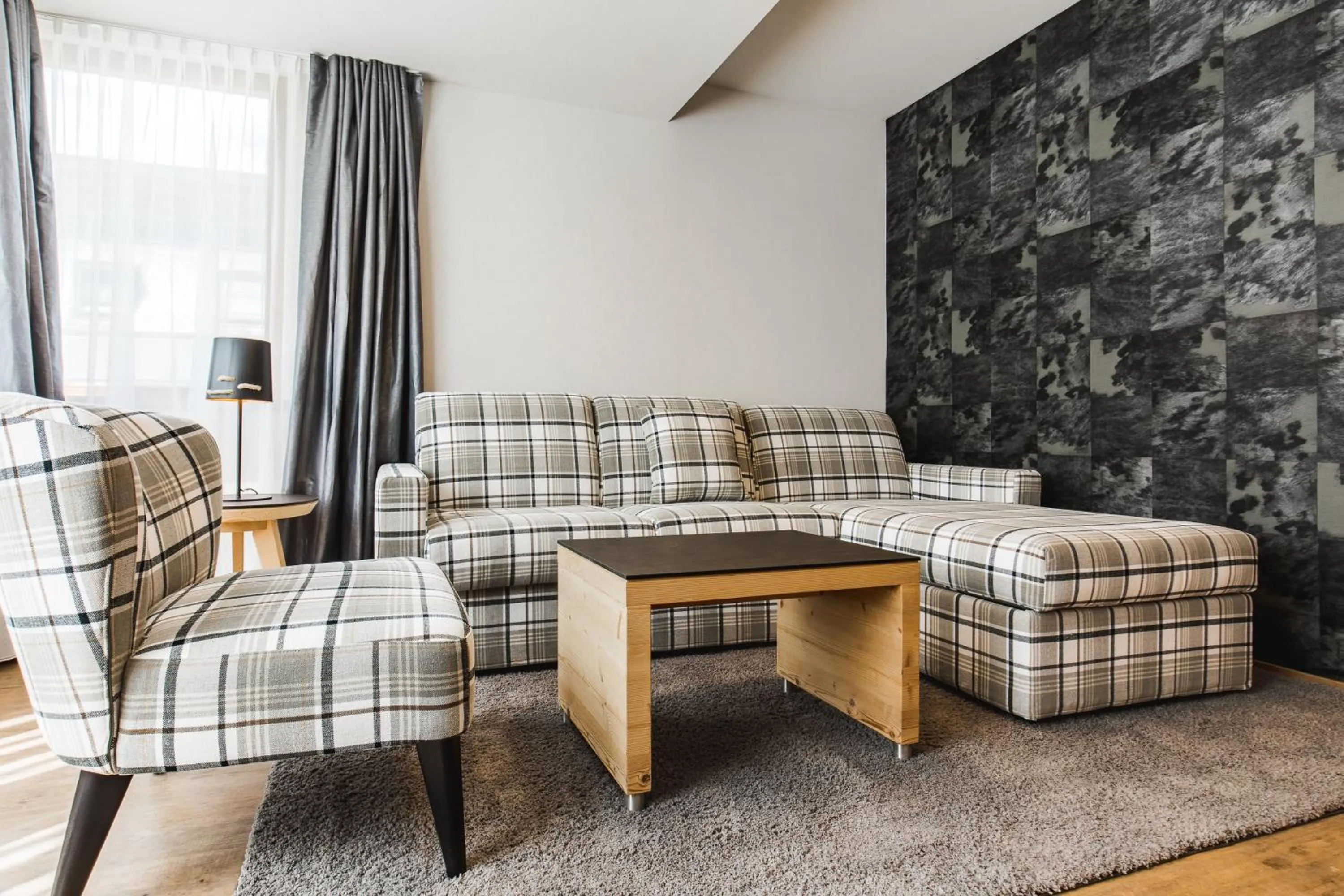 Living room in DAS VIER Sport,- und Wellnesshotel