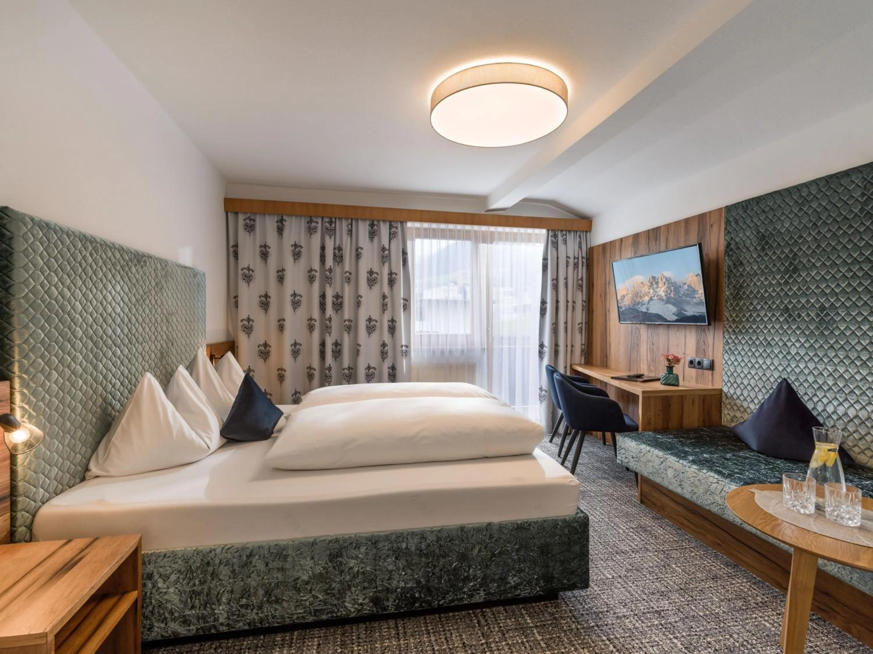 Photo of the whole room, Bed in Hotel Landhaus Zillertal