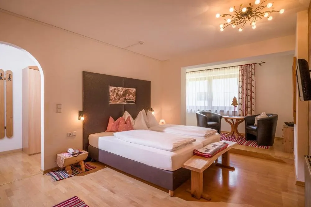 Photo of the whole room, Bed in Hotel Landhaus Zillertal