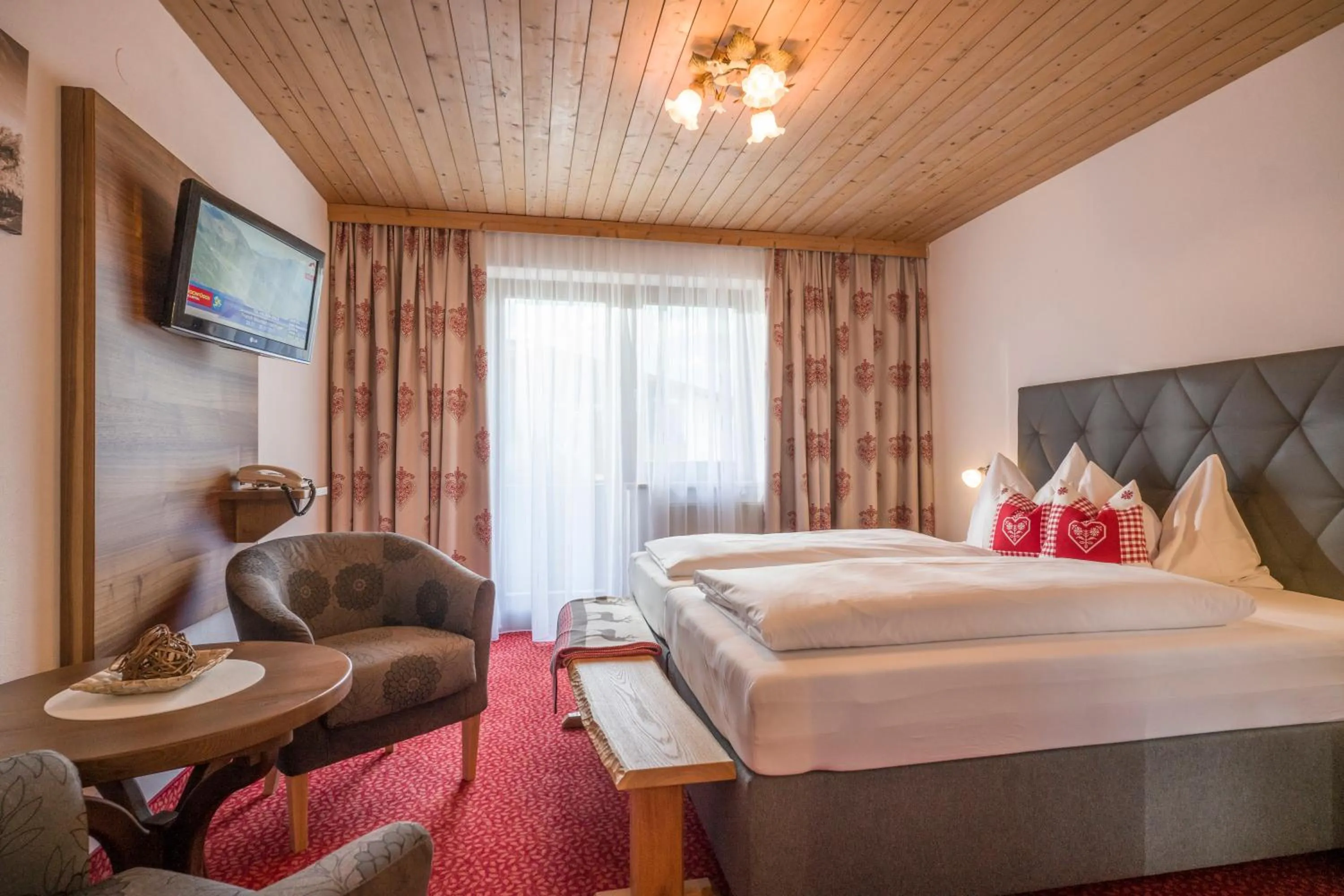 Bedroom, Bed in Hotel Landhaus Zillertal