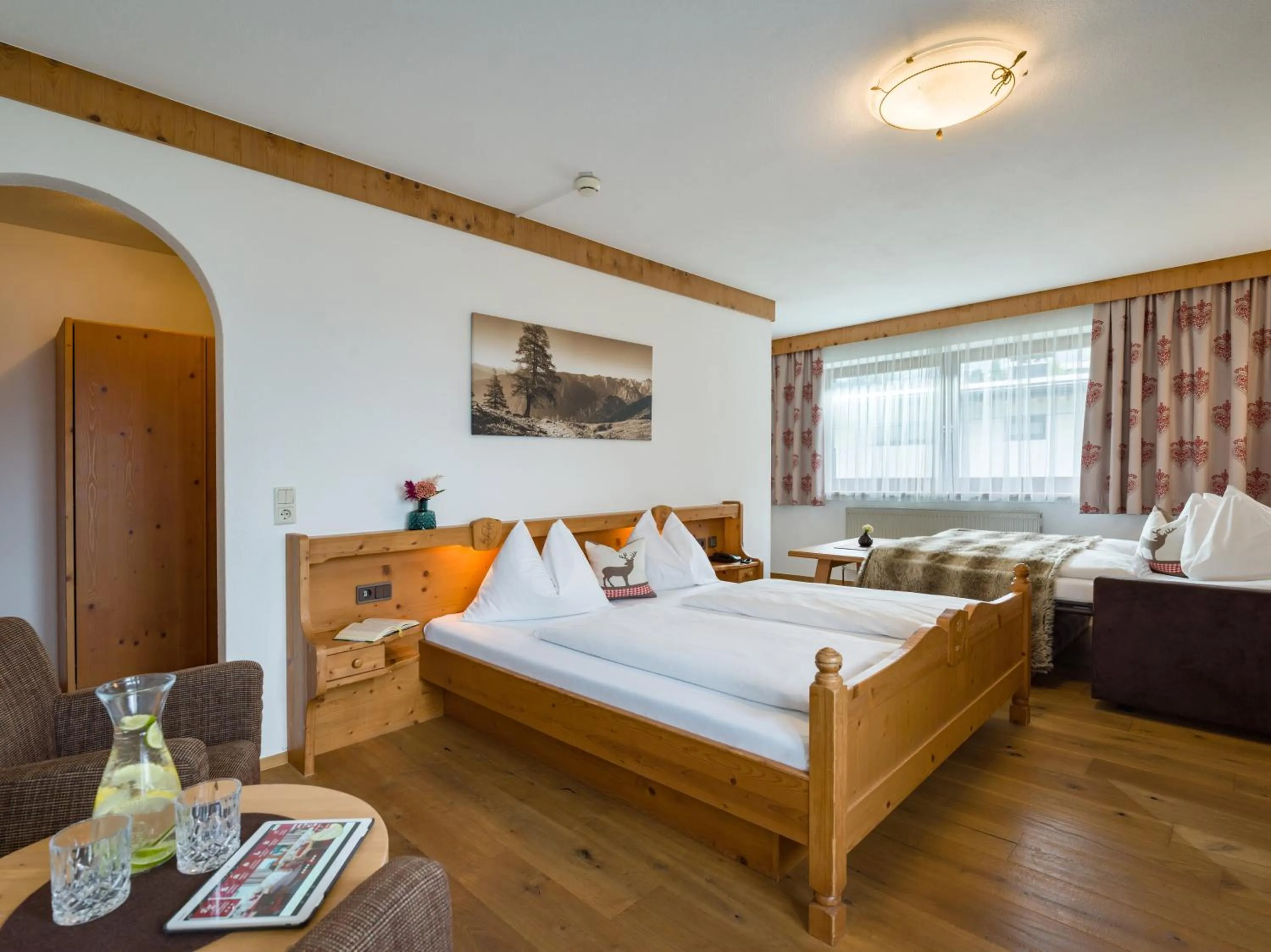 Photo of the whole room, Bed in Hotel Landhaus Zillertal