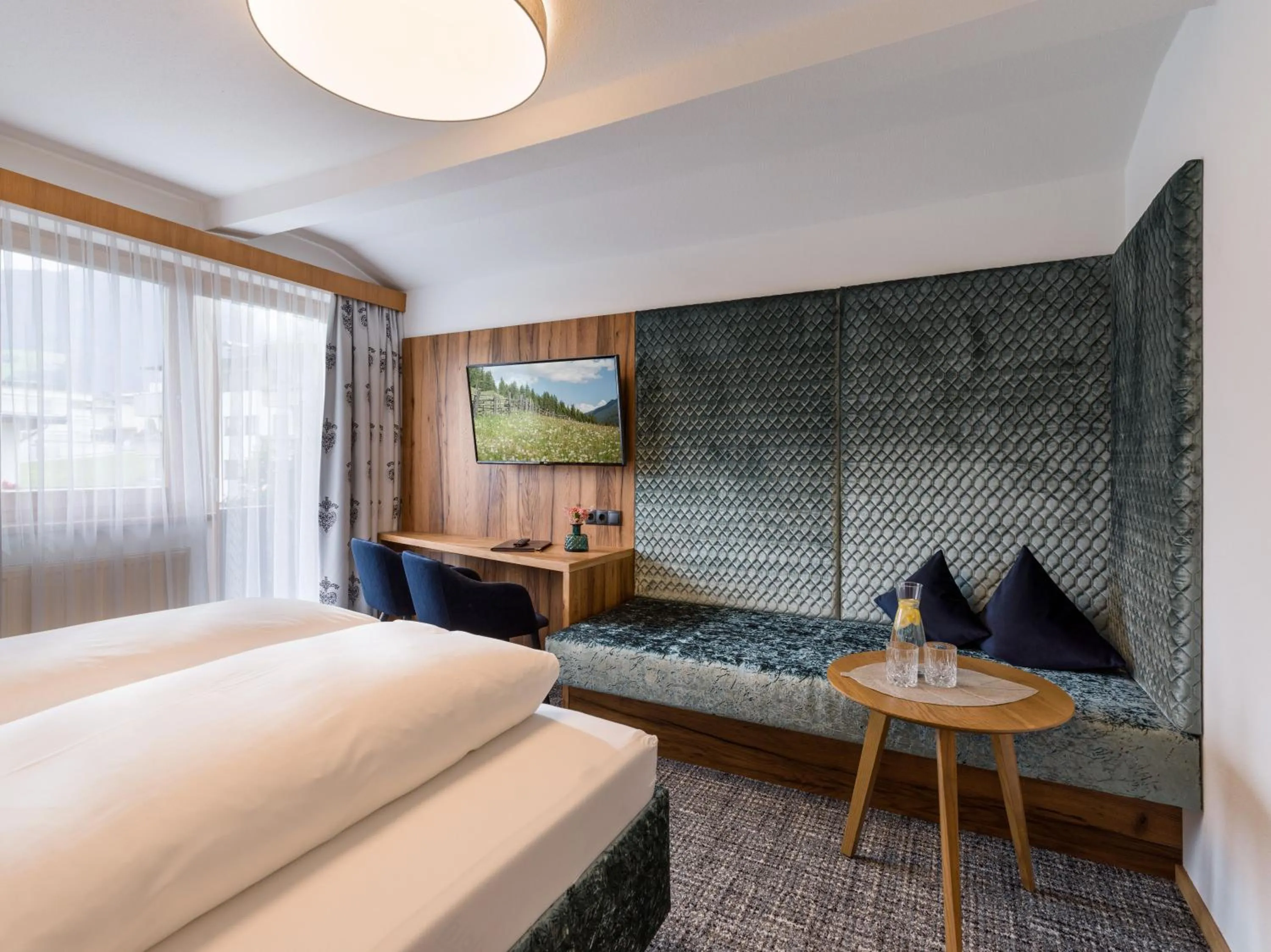 Photo of the whole room, Bed in Hotel Landhaus Zillertal