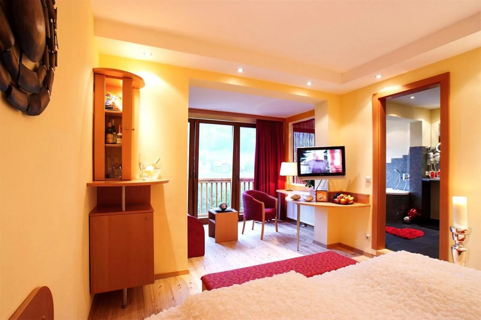 Living room, Bed in Der Kirchheimerhof - Superior