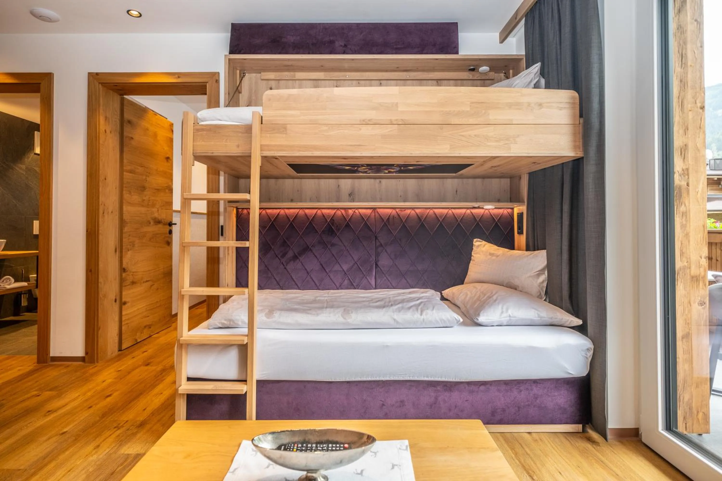 bunk bed in Dorfkrug Kaprun - Luxury Suites & Appartements