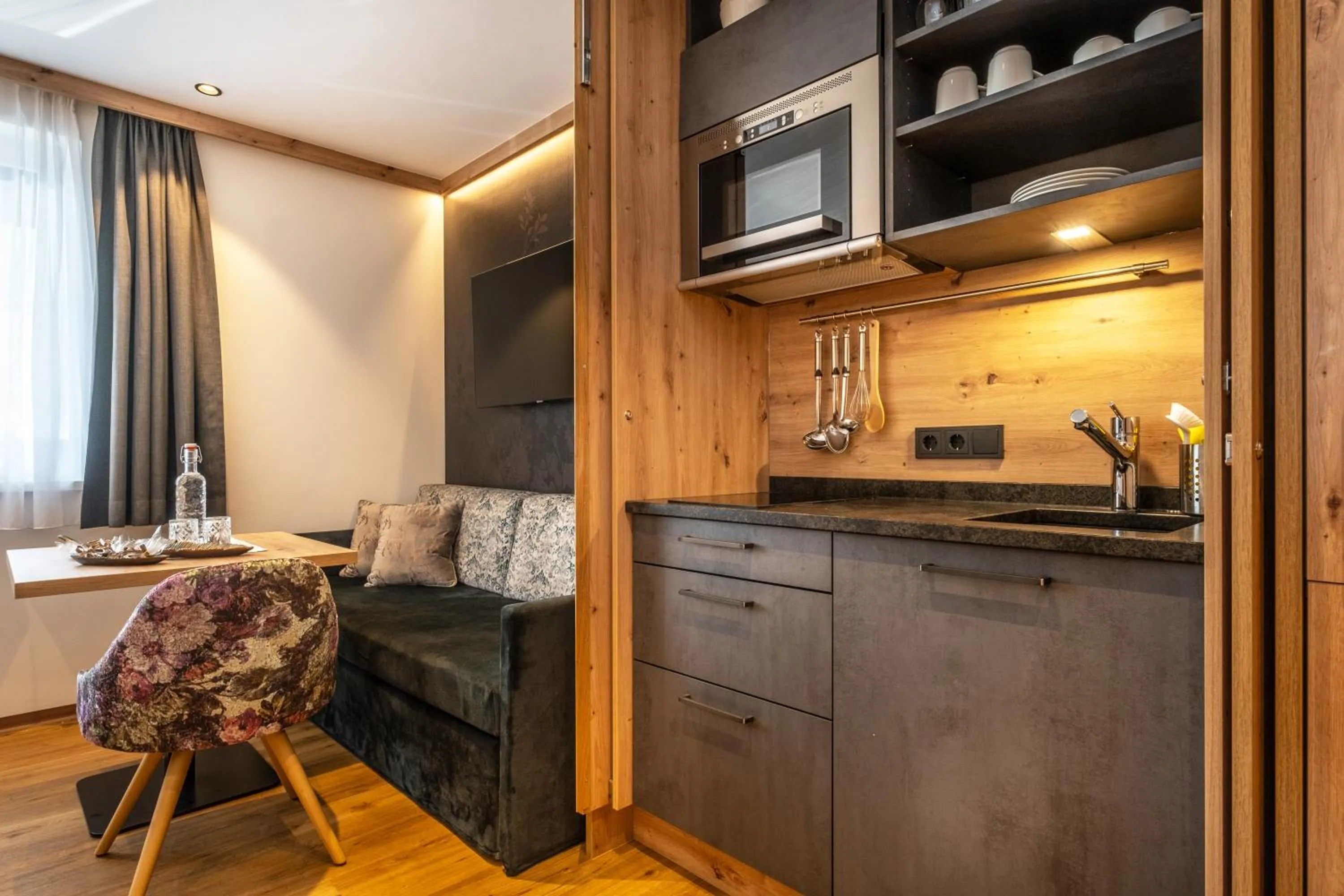 Kitchen or kitchenette in Dorfkrug Kaprun - Luxury Suites & Appartements